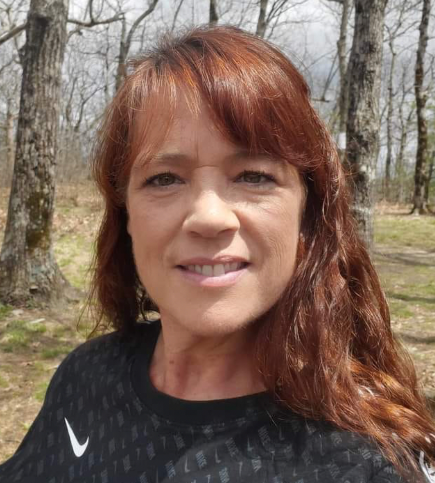 Lisa Rogers Eaton, 56, was brutally attacked with a hatchet in her home, authorities say