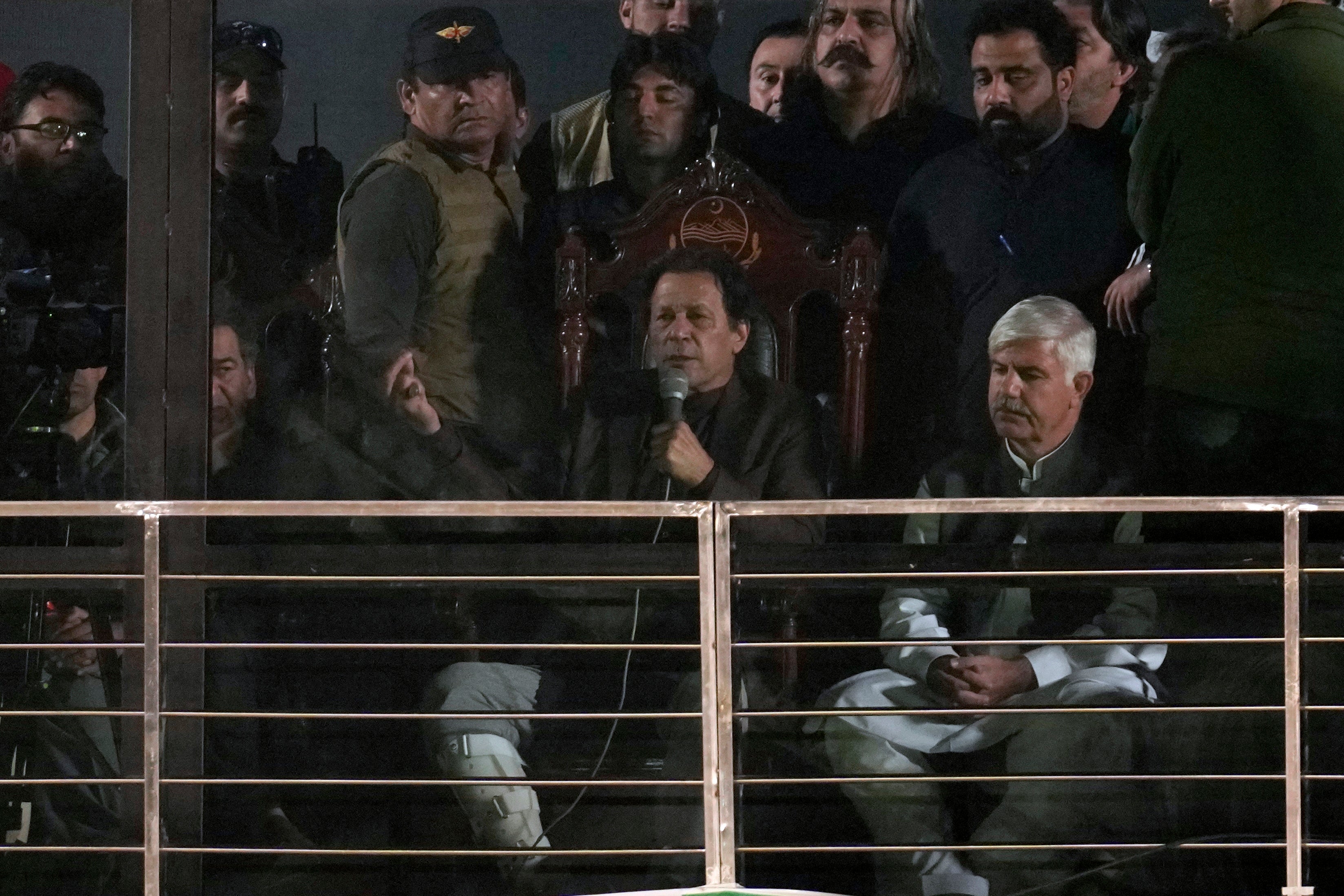 Pakistan’s former prime minister and opposition leader Imran Khan, centre, addresses his supporters during a rally in Rawalpindi