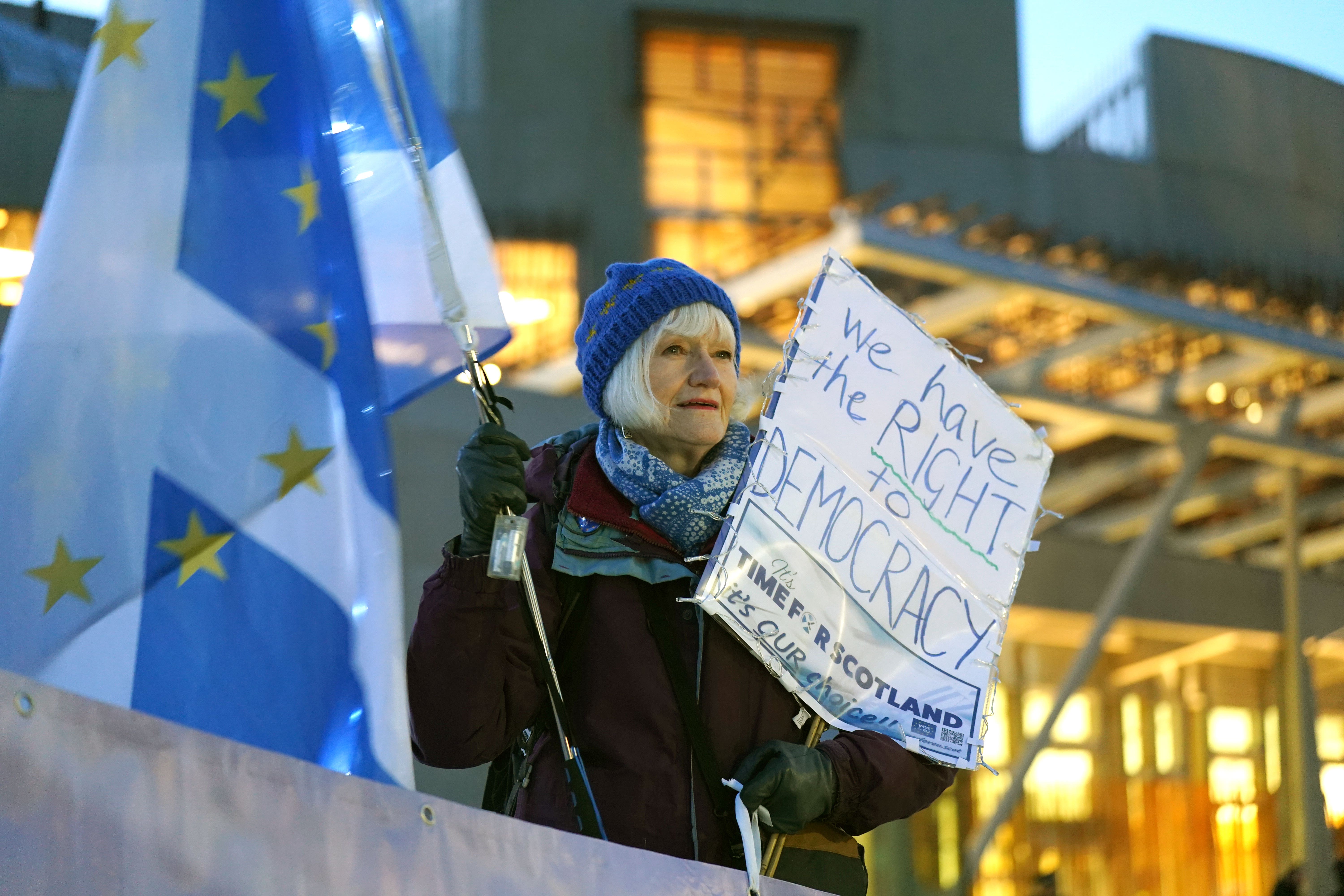 A rally in favour of Scottish independence took place outside Holyrood after the Supreme Court ruling (PA)