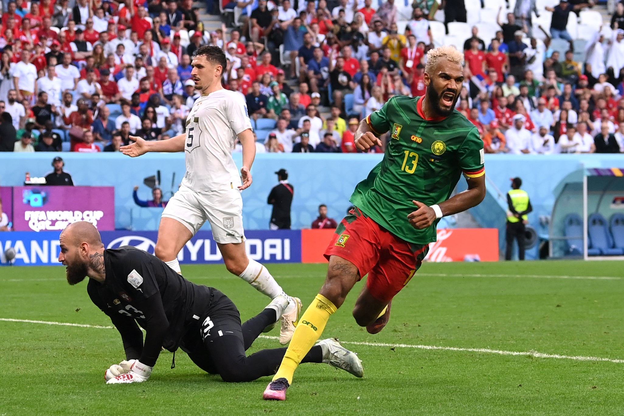 Cameroon score two quick-fire goals to claim point in thriller against Serbia 