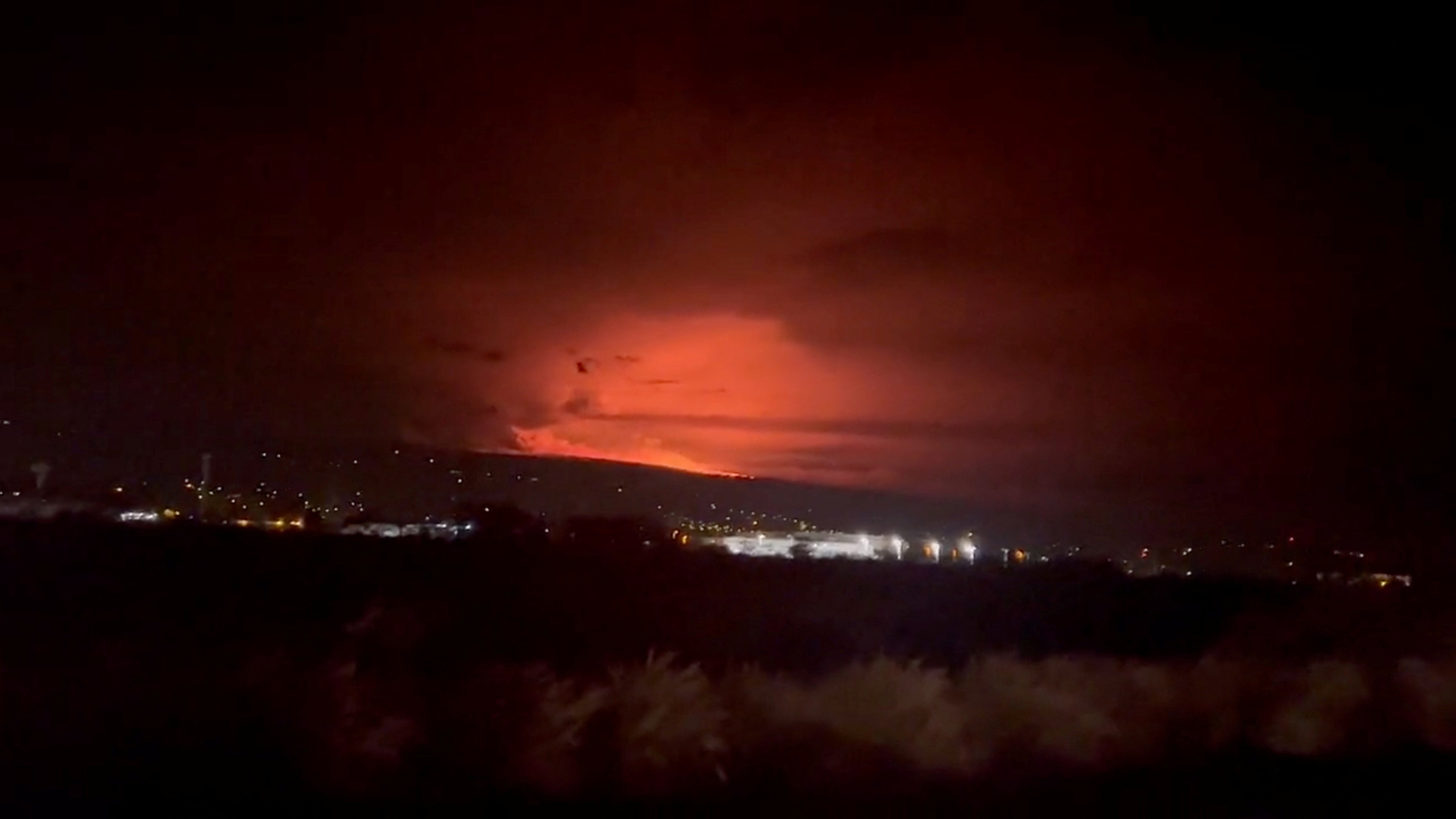 A general view of Hawaii's Mauna Loa volcano, in Kailua-Kona, Hawaii, U.S., November 28, 2022 in this screen grab taken from a social media video