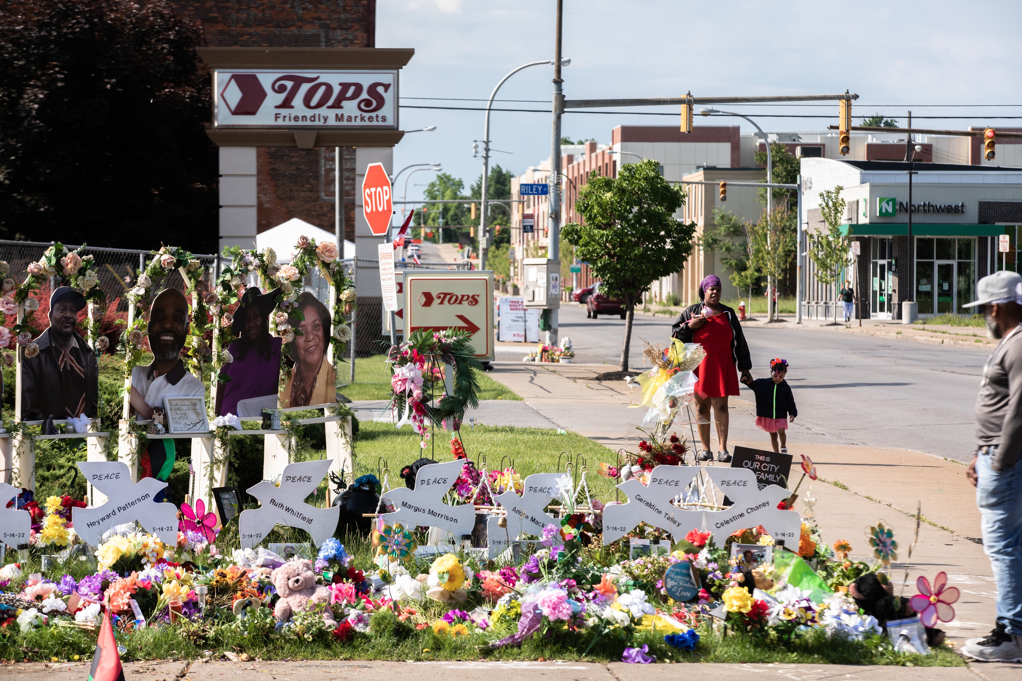 A makeshift memorial for victims of the Tops massacre recognises the 10 people killed in the attack.