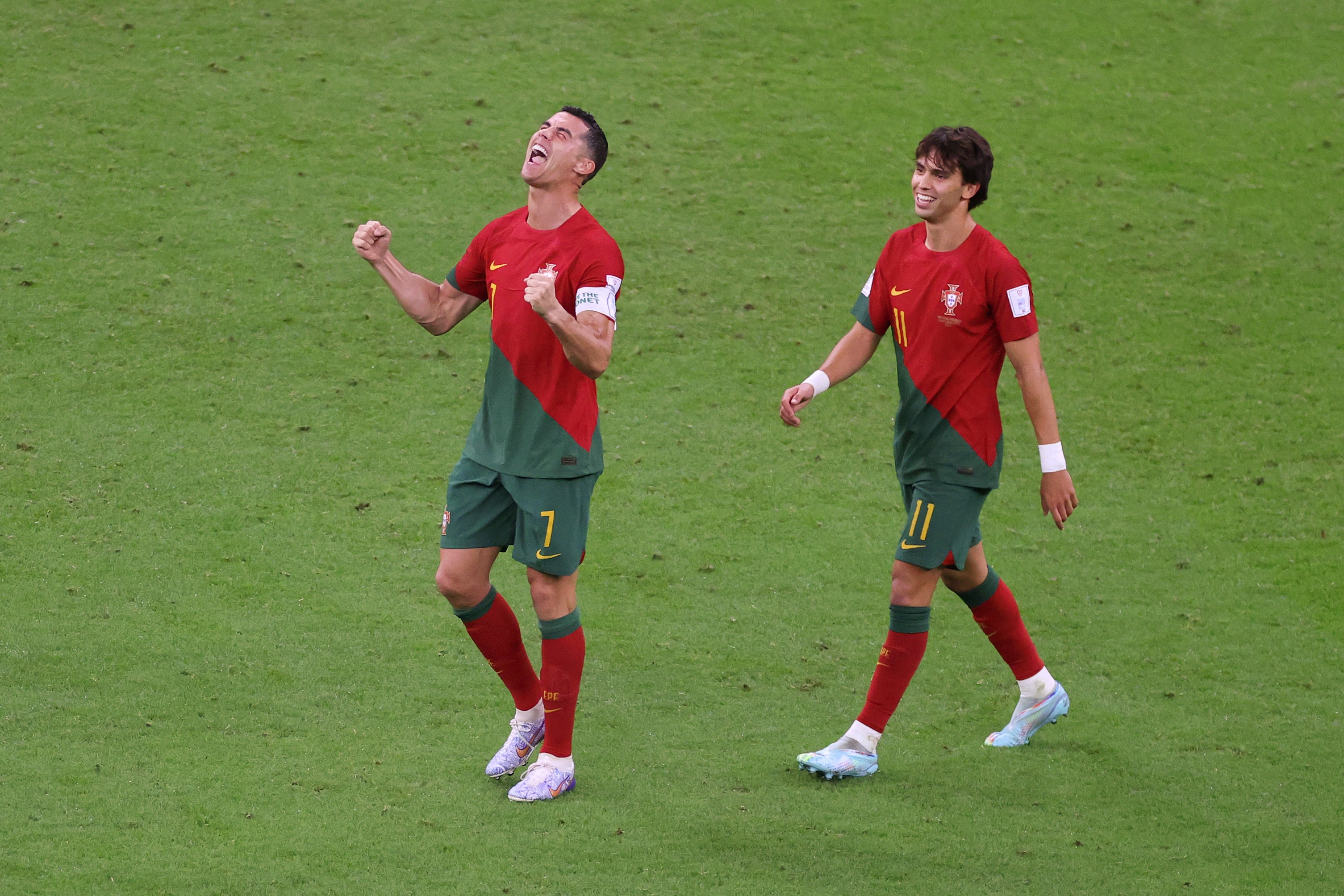 Cristiano Ronaldo of Portugal celebrates the team's first goal scored by Bruno Fernandes