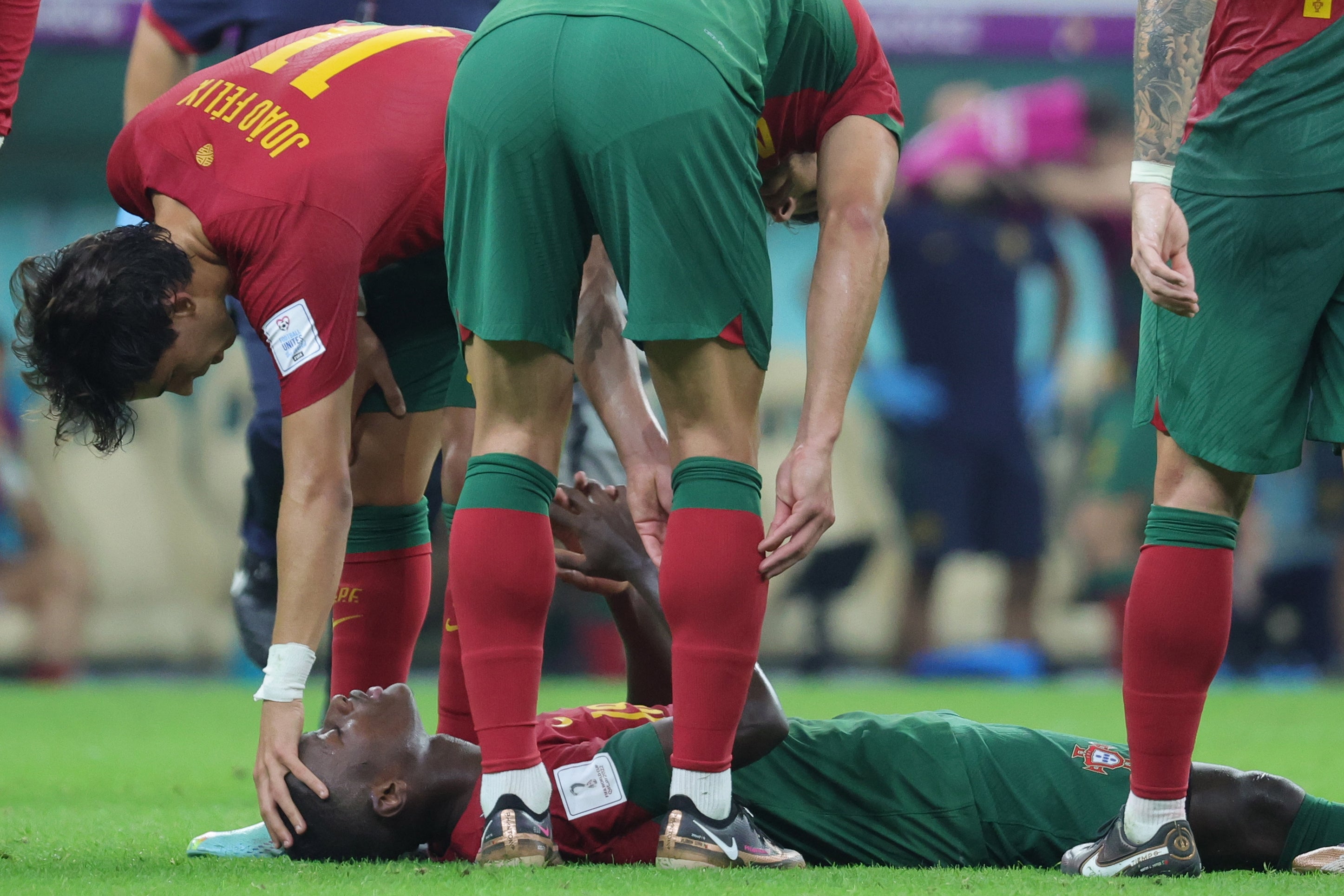 Nuno Mendes (bottom) was taken off injured after an encouraging display