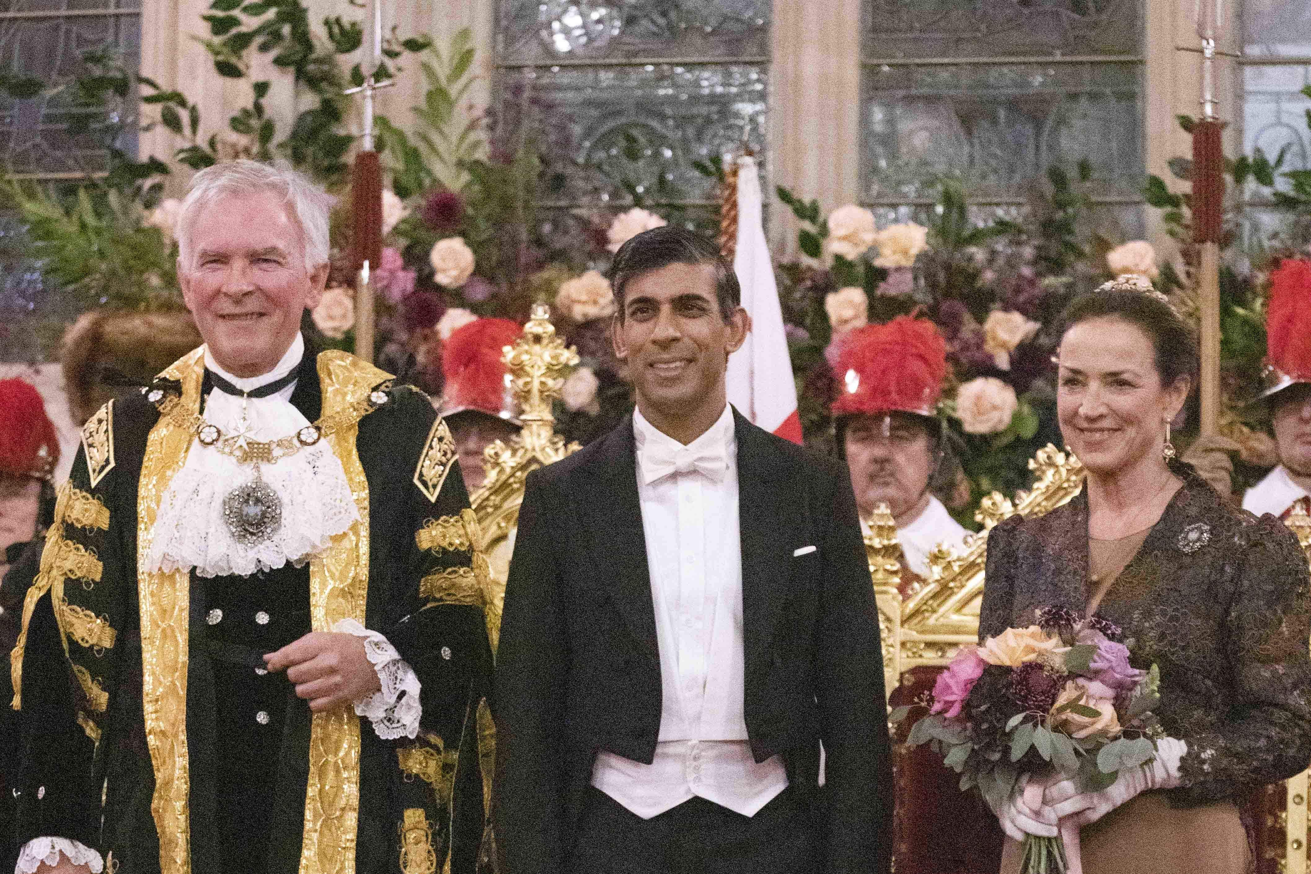 The Lord Mayor of London, Nicholas Lyons (left), Prime Minister Rishi Sunak (centre) and Lady Mayoress Felicity Lyons (Belinda Jiao/PA)