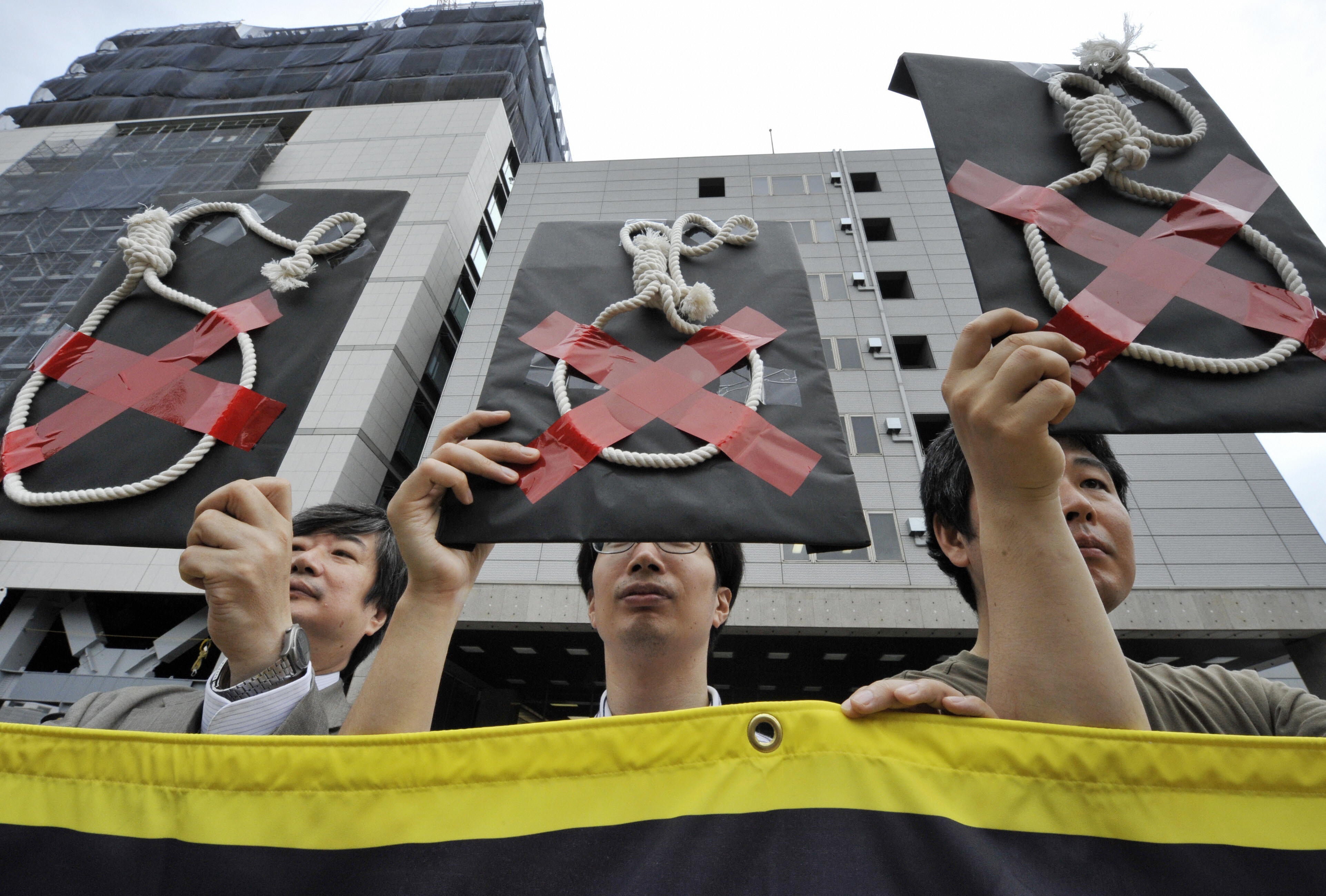 File photo: Members of Amnesty International hold a rally to protest against Japan’s death penalty in Tokyo