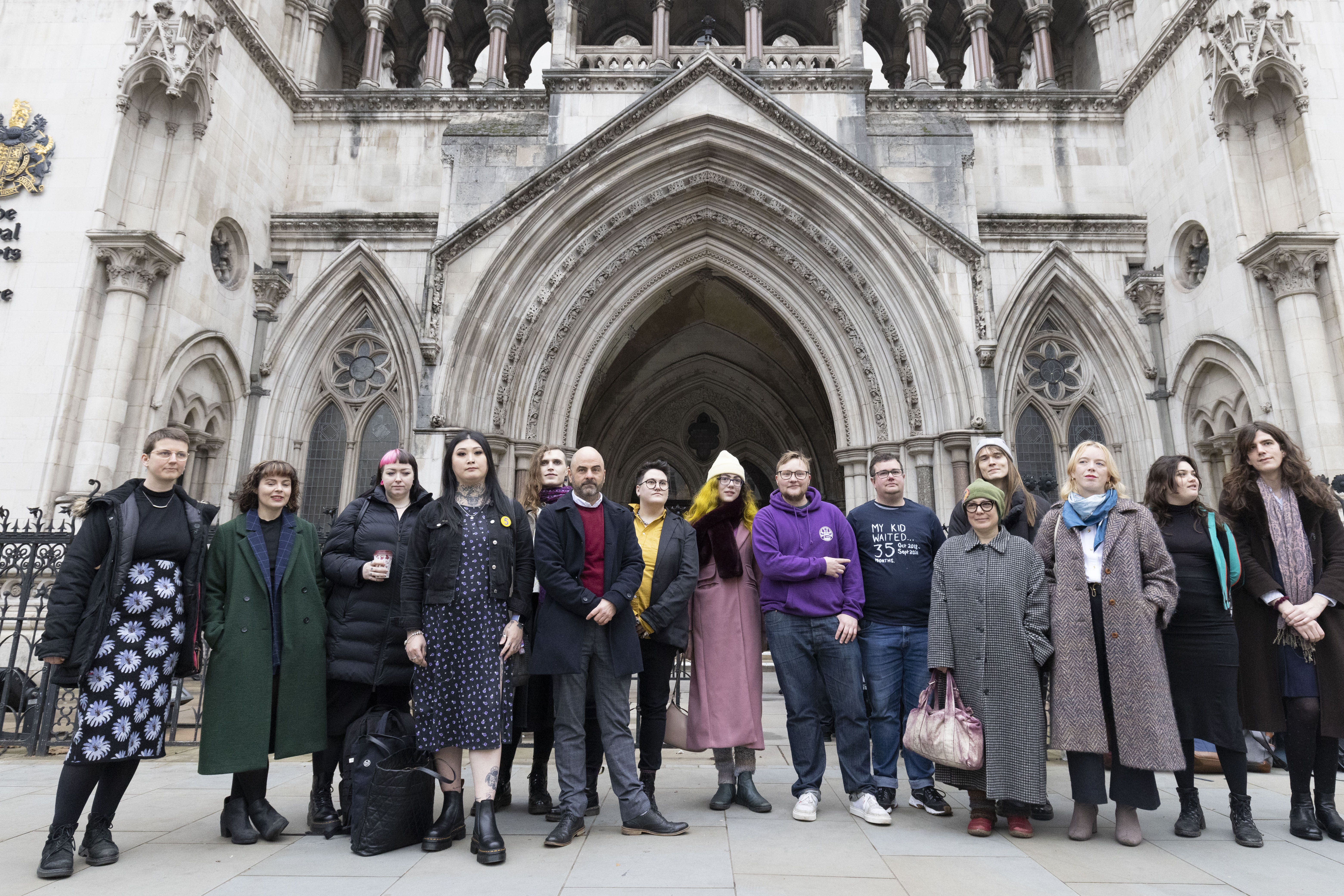 Trans youth group Gendered Intelligence outside the Royal Courts of Justice in London (Belinda Jiao/PA)