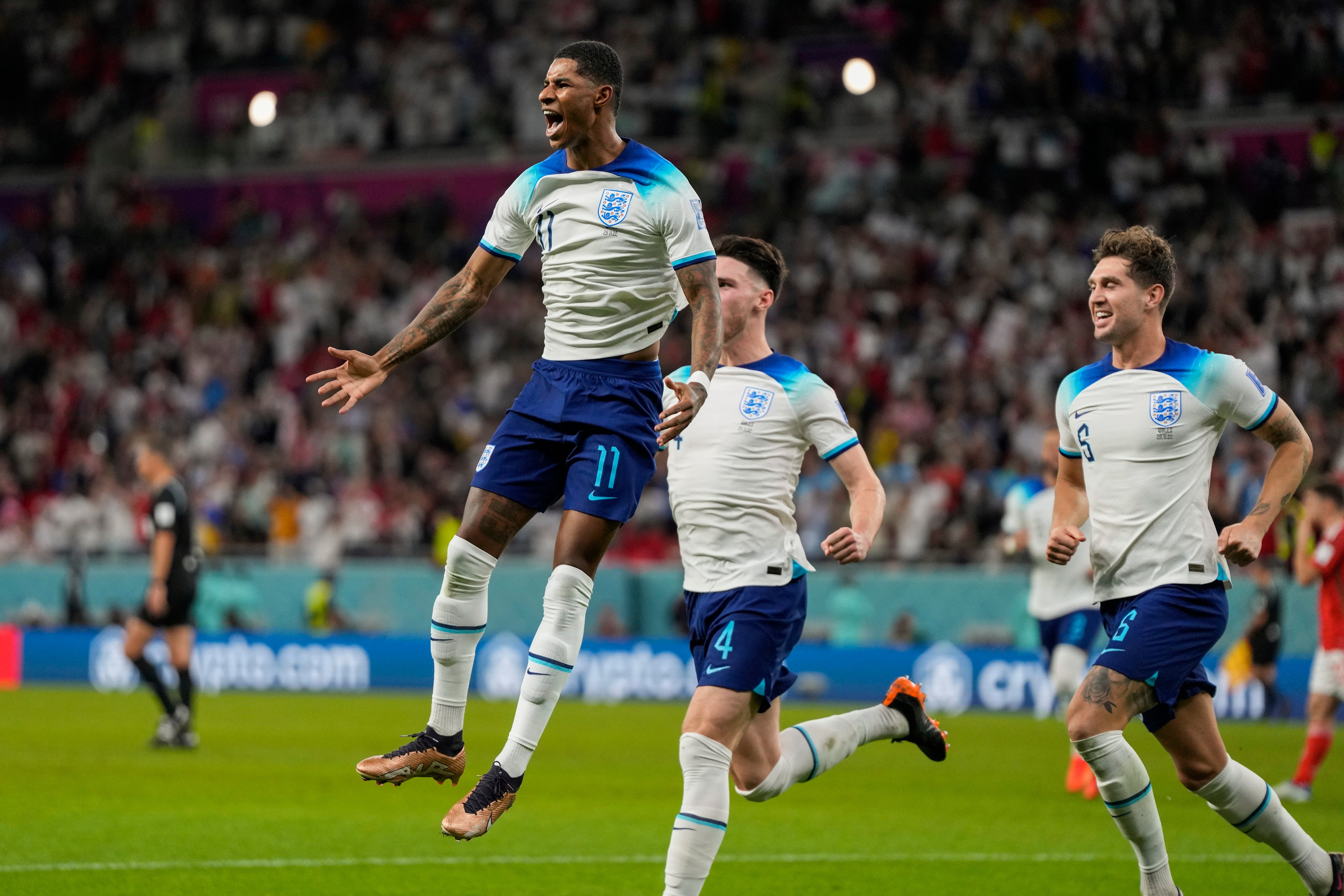 Rashford celebrates with team mates