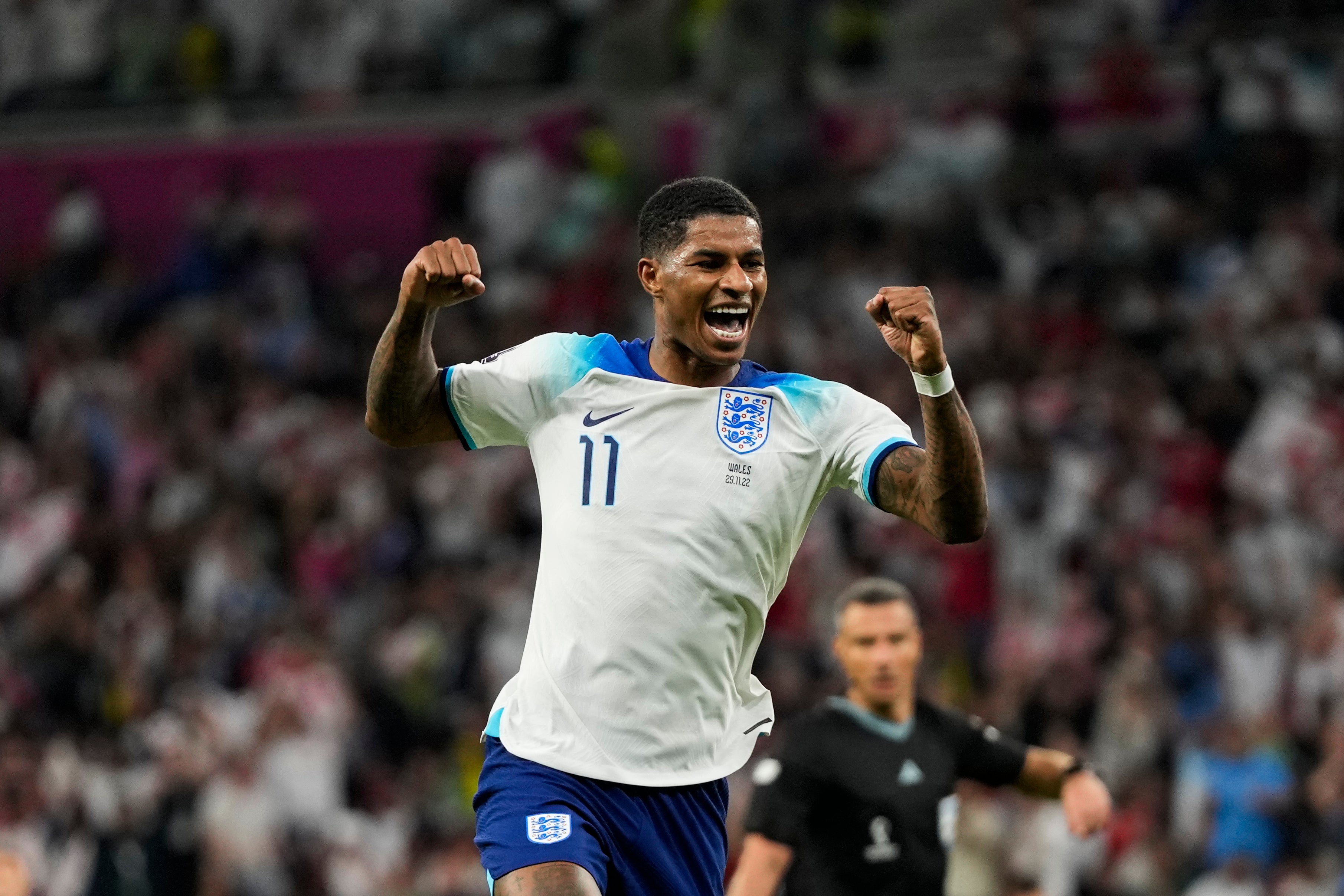 Rashford celebrates after scoring England’s third goal