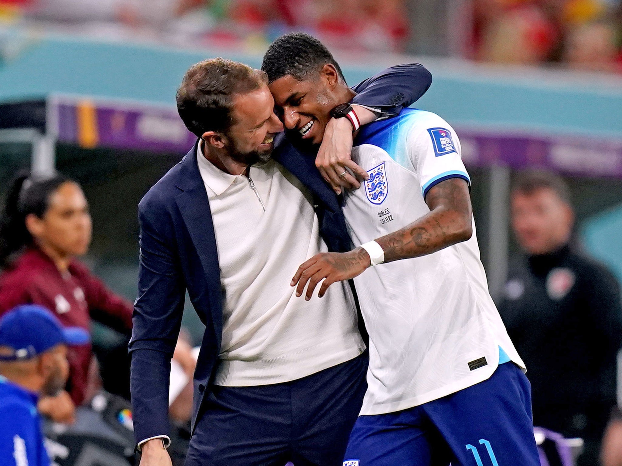 Gareth Southgate hugs Marcus Rashford as he is substituted