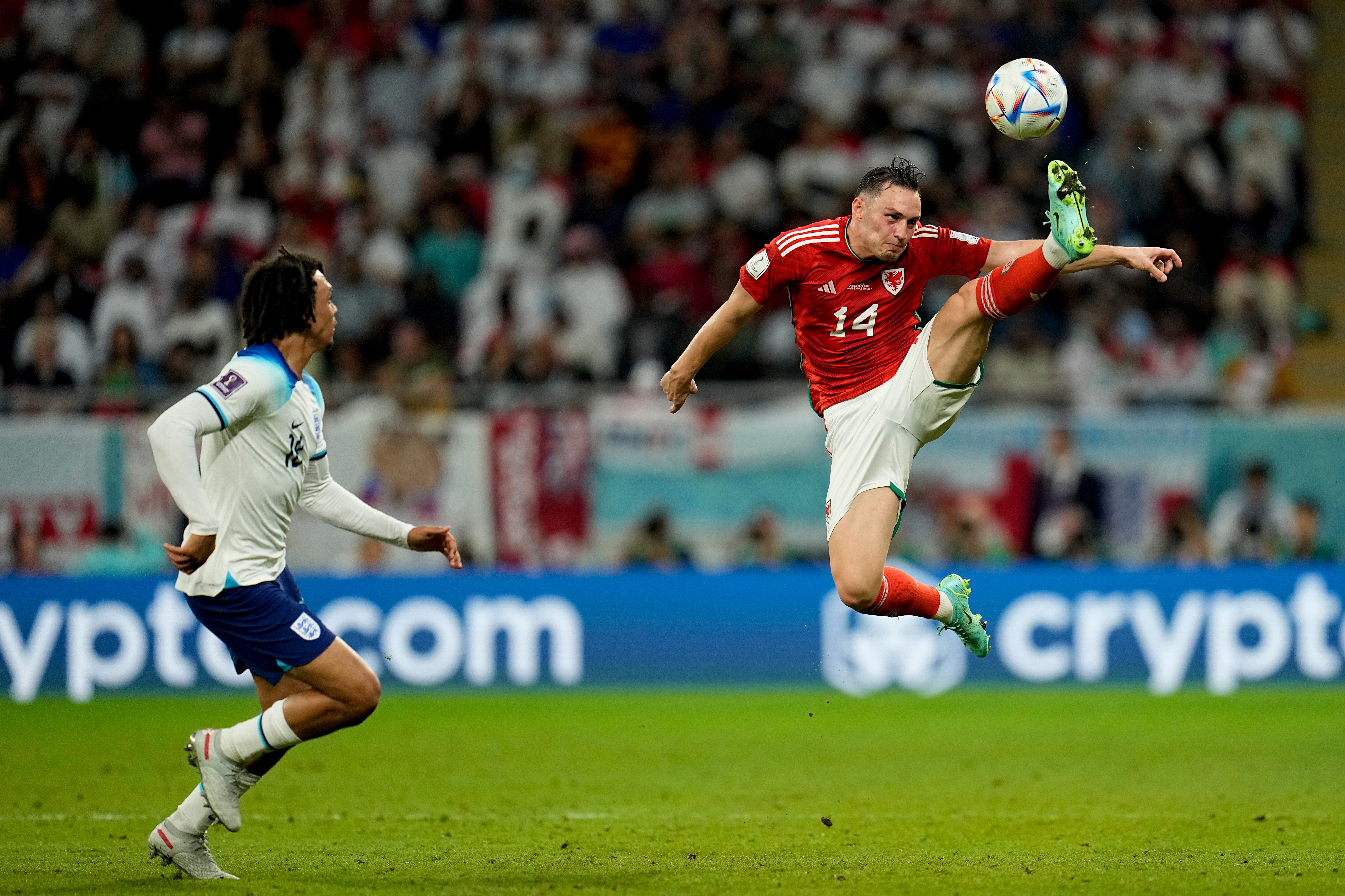 Connor Roberts rises to kick the ball