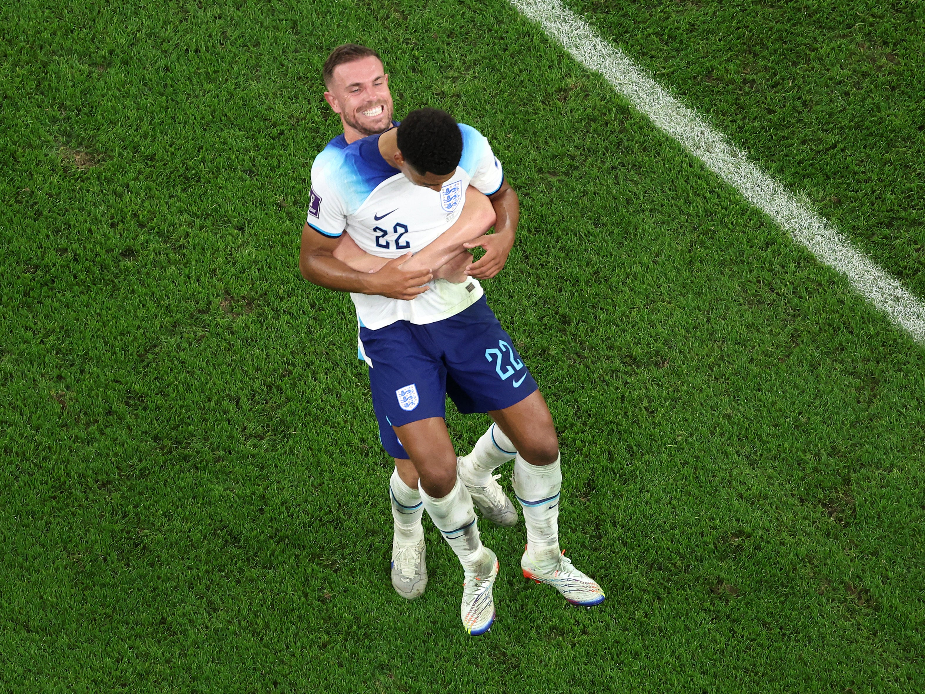 Jordan Henderson and Jude Bellingham of England celebrate their 3-0 victory