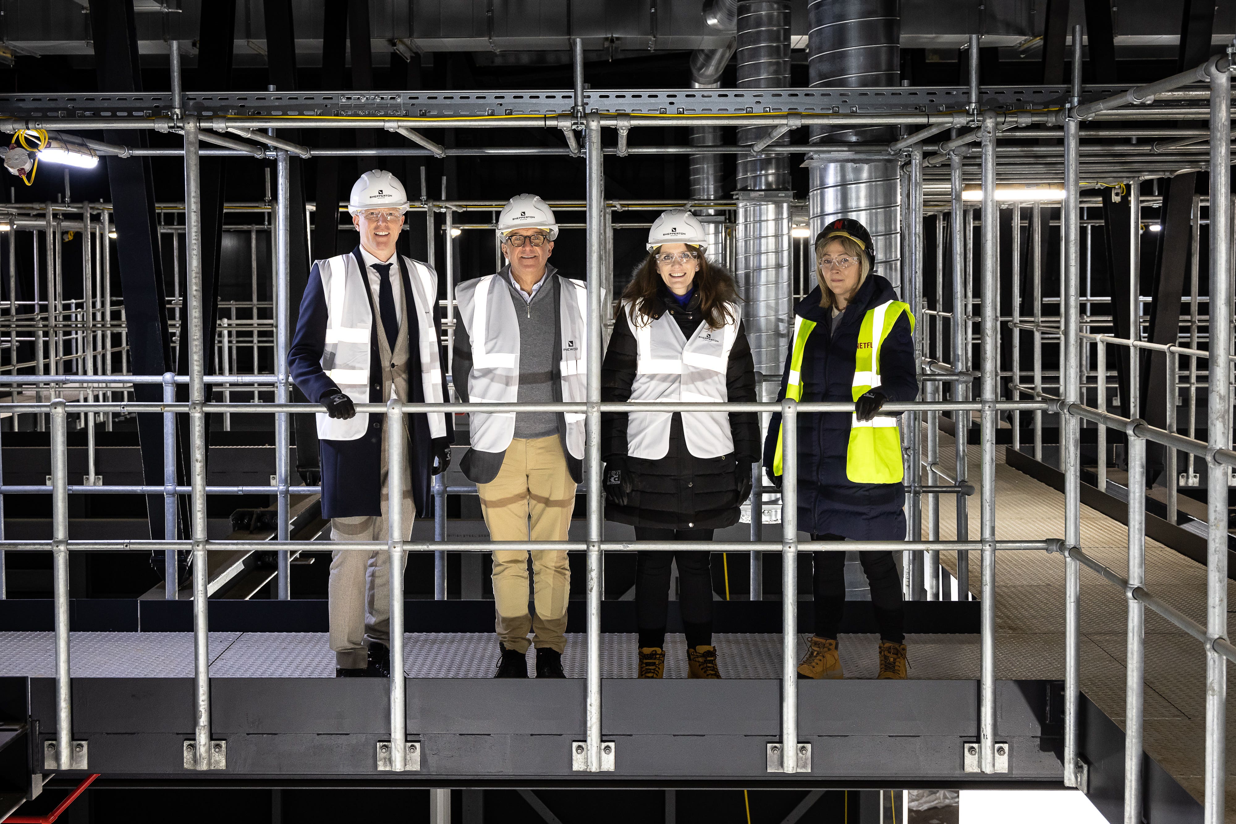 Chris Bird from Prime Video, Paul Golding from Pinewood Group, Culture Secretary Michelle Donelan and Anna Mallett from Netflix (Tim Whitby/PA)