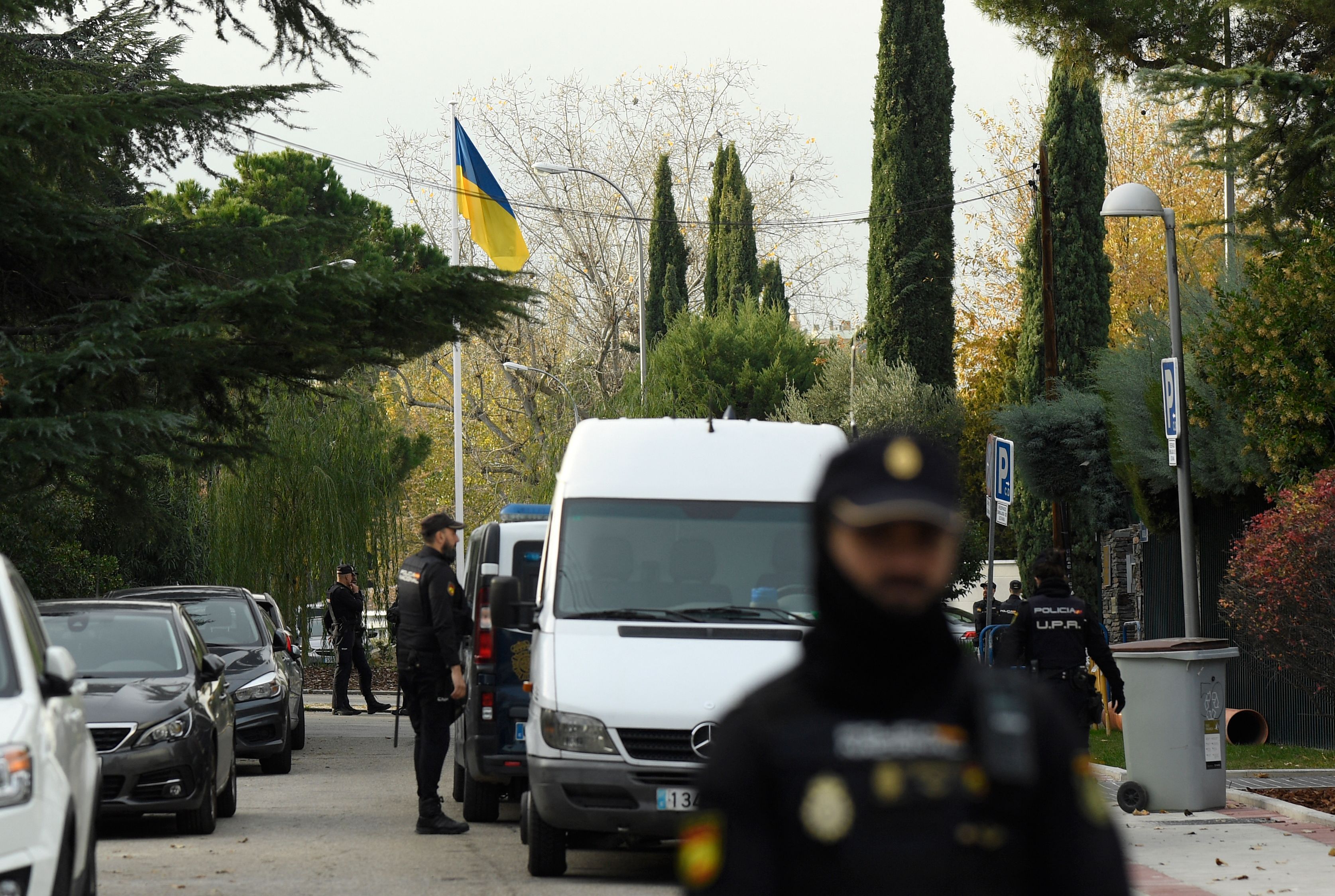 Spanish policemen secure the area around the Ukrainian embassy in Madrid