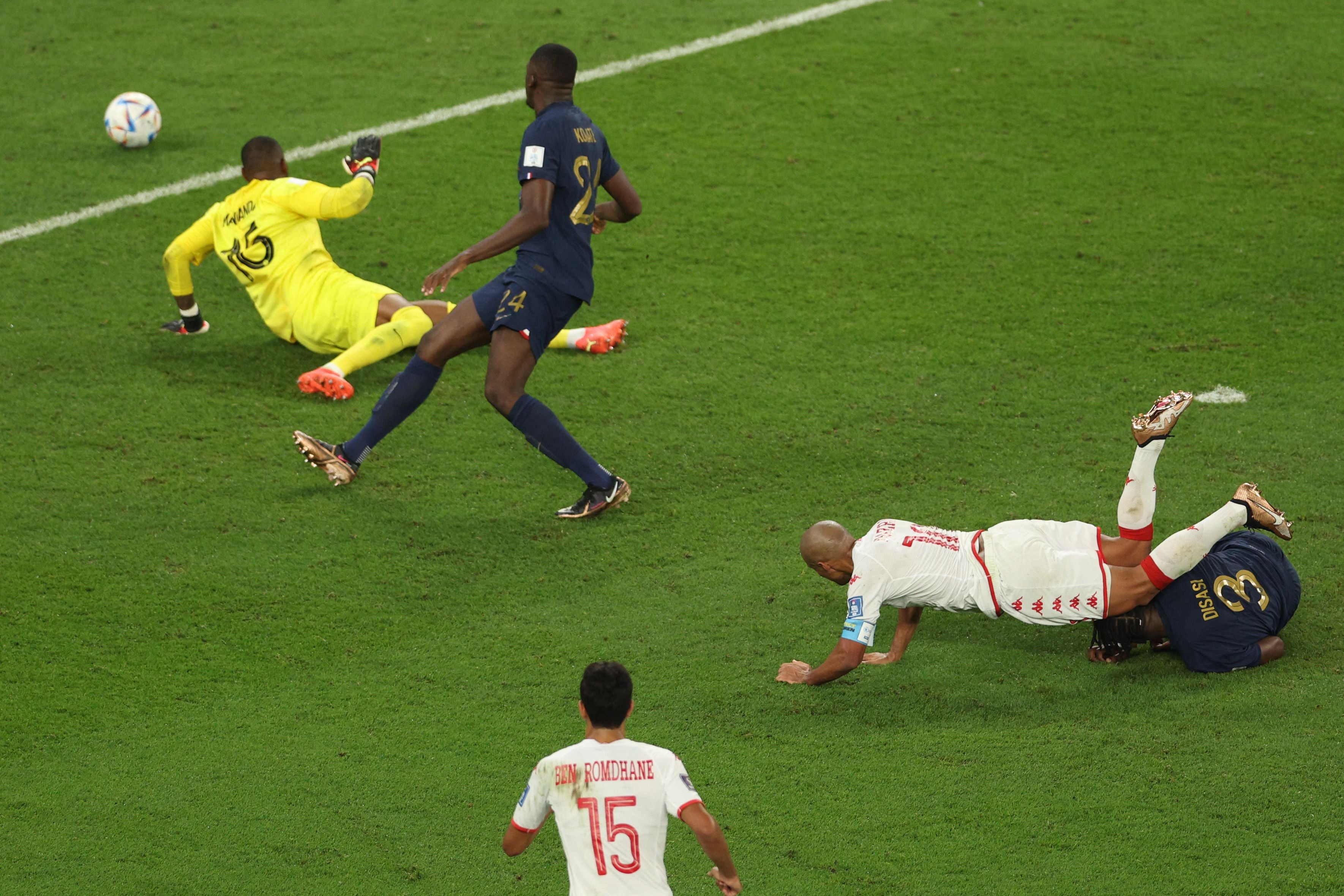 Tunisia’s forward Wahbi Khazri falls as he scores