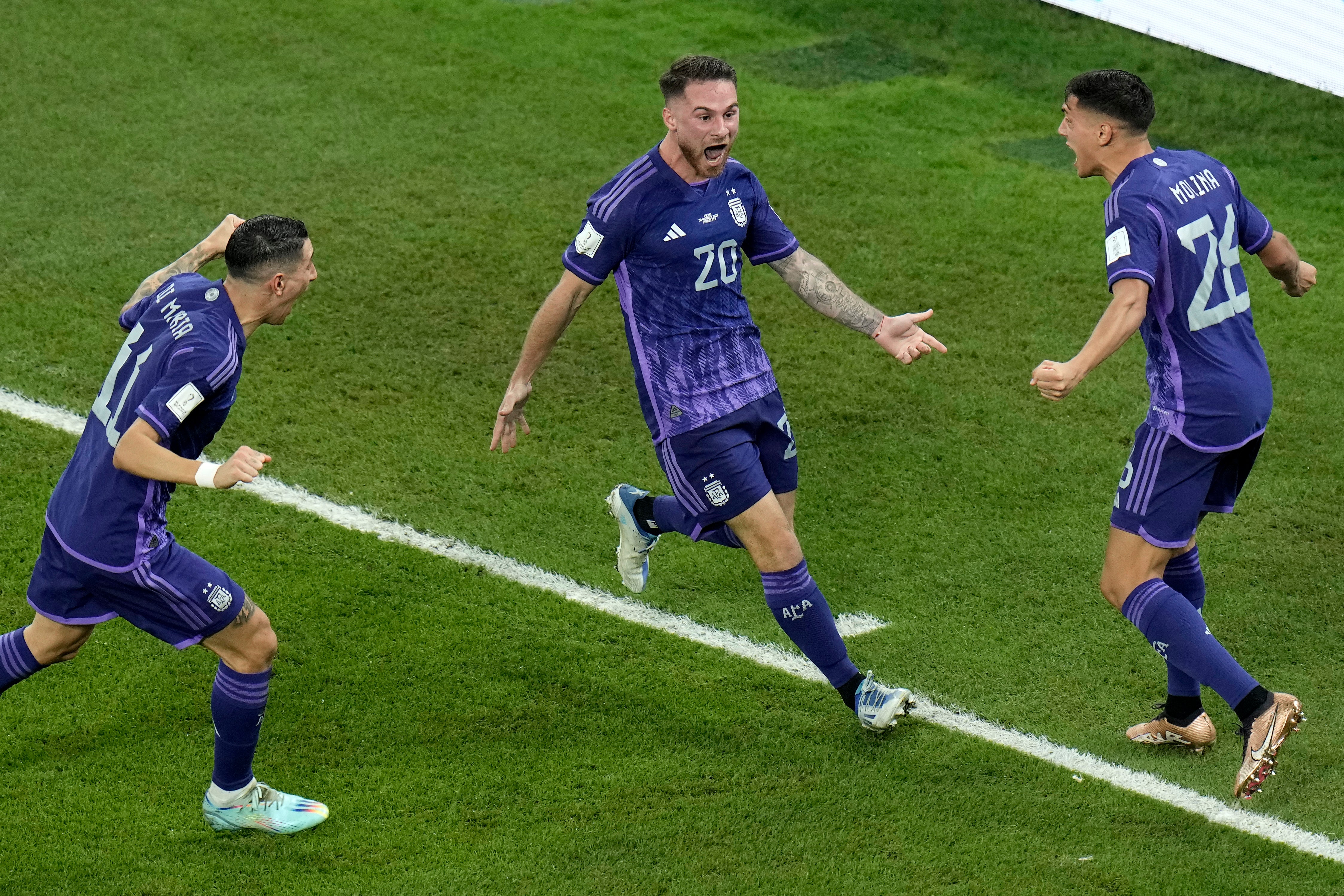 Argentina's Alexis Mac Allister celebrates after scoring