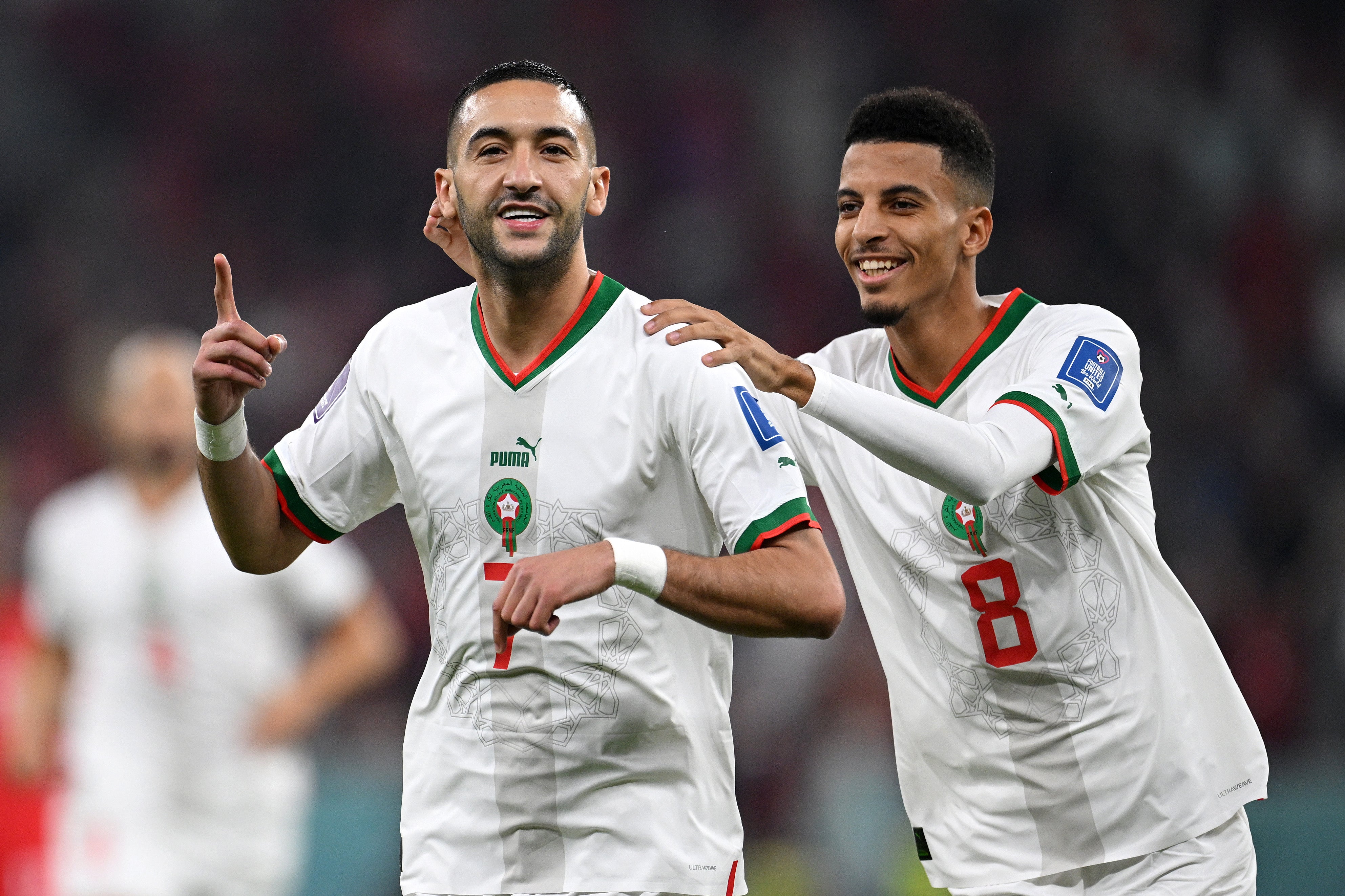 Hakim Ziyech (left) of Morocco celebrates with Azzedine Ounahi after scoring the team’s first goal against Canada