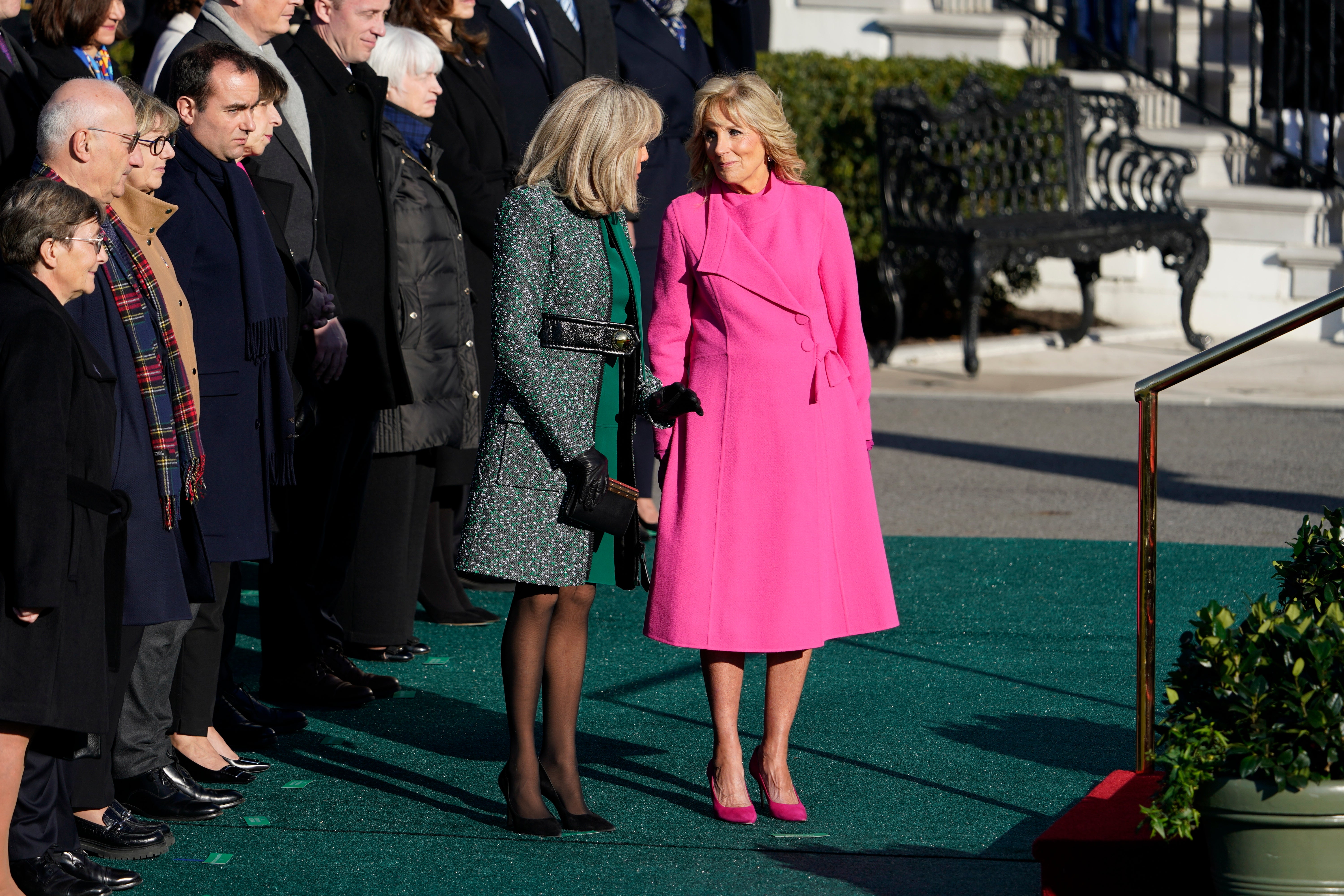 First lady Jill Biden and Brigitte Macron of France, stand together during a State Arrival Ceremony on the South Lawn of the White House in Washington, Thursday, Dec. 1, 2022