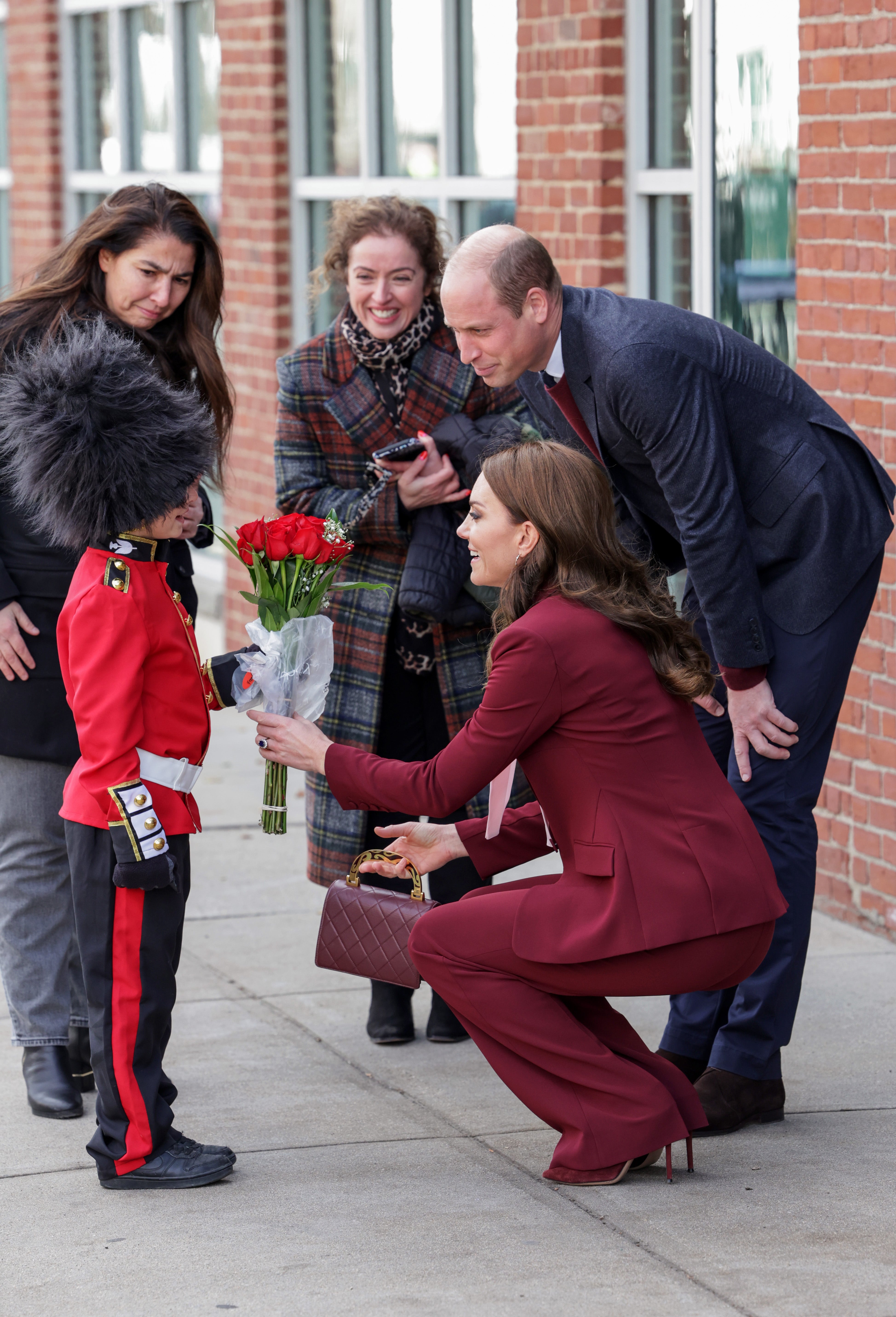 Kate and William greet eight year old dressed as member of King’s Guard