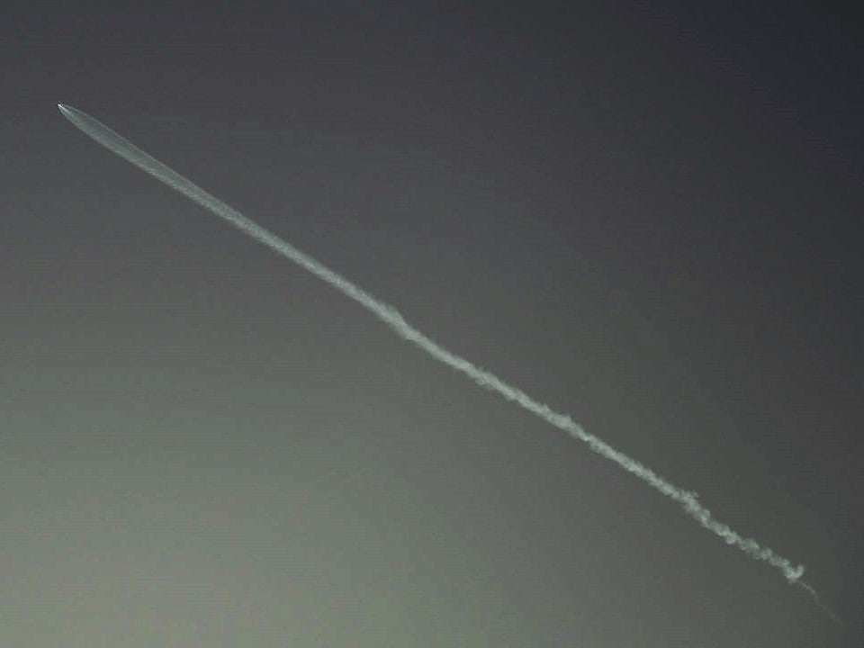 A SpaceX Falcon 9 rocket with a payload of 53 Starlink satellites is seen above Lawndale, California, after being launched from Vandenberg Space Force Base, on 27 October, 2022