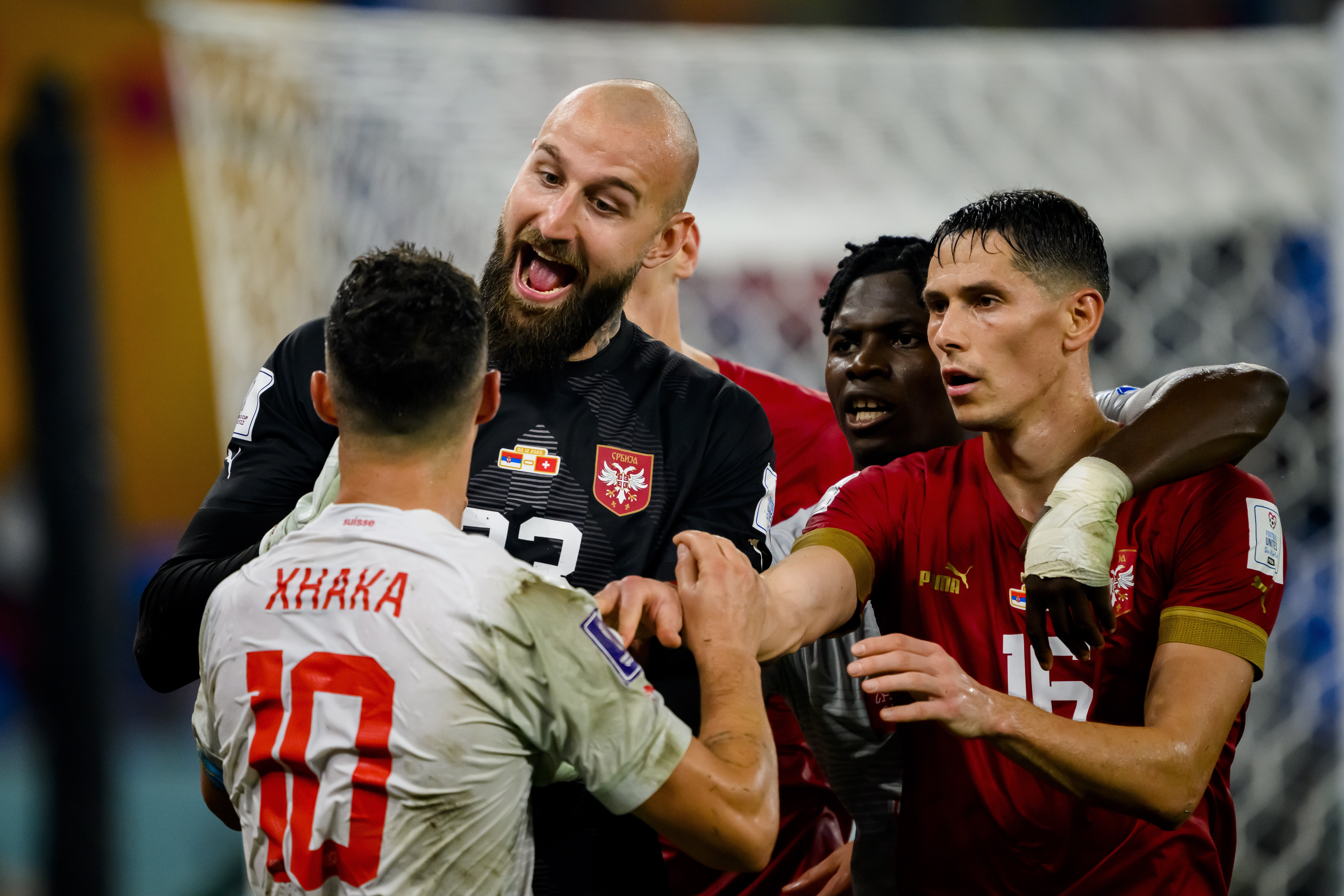 Granit Xhaka argues with Serbia's goalkeeper Vanja Milinkovic-Savic