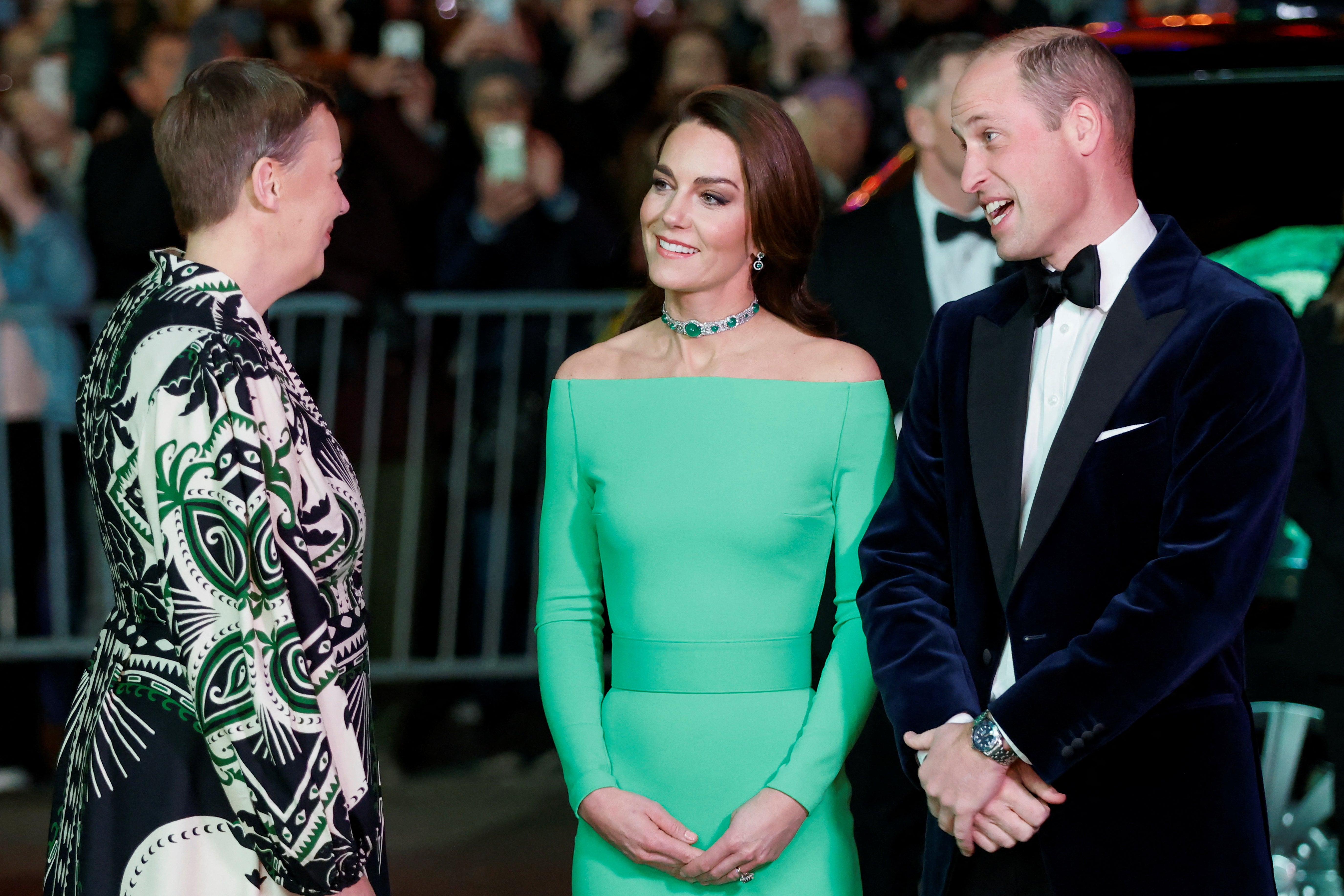 The royal paired her green ensemble with a choker once worn by Princess Diana