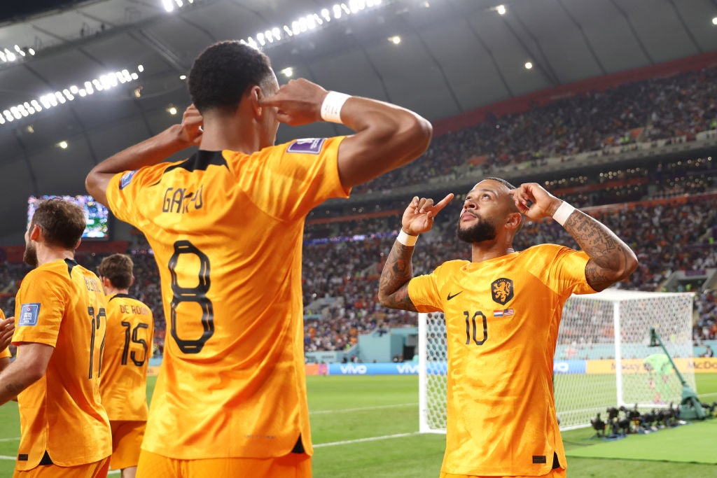 Cody Gakpo and Memphis Depay celebrate against the USA