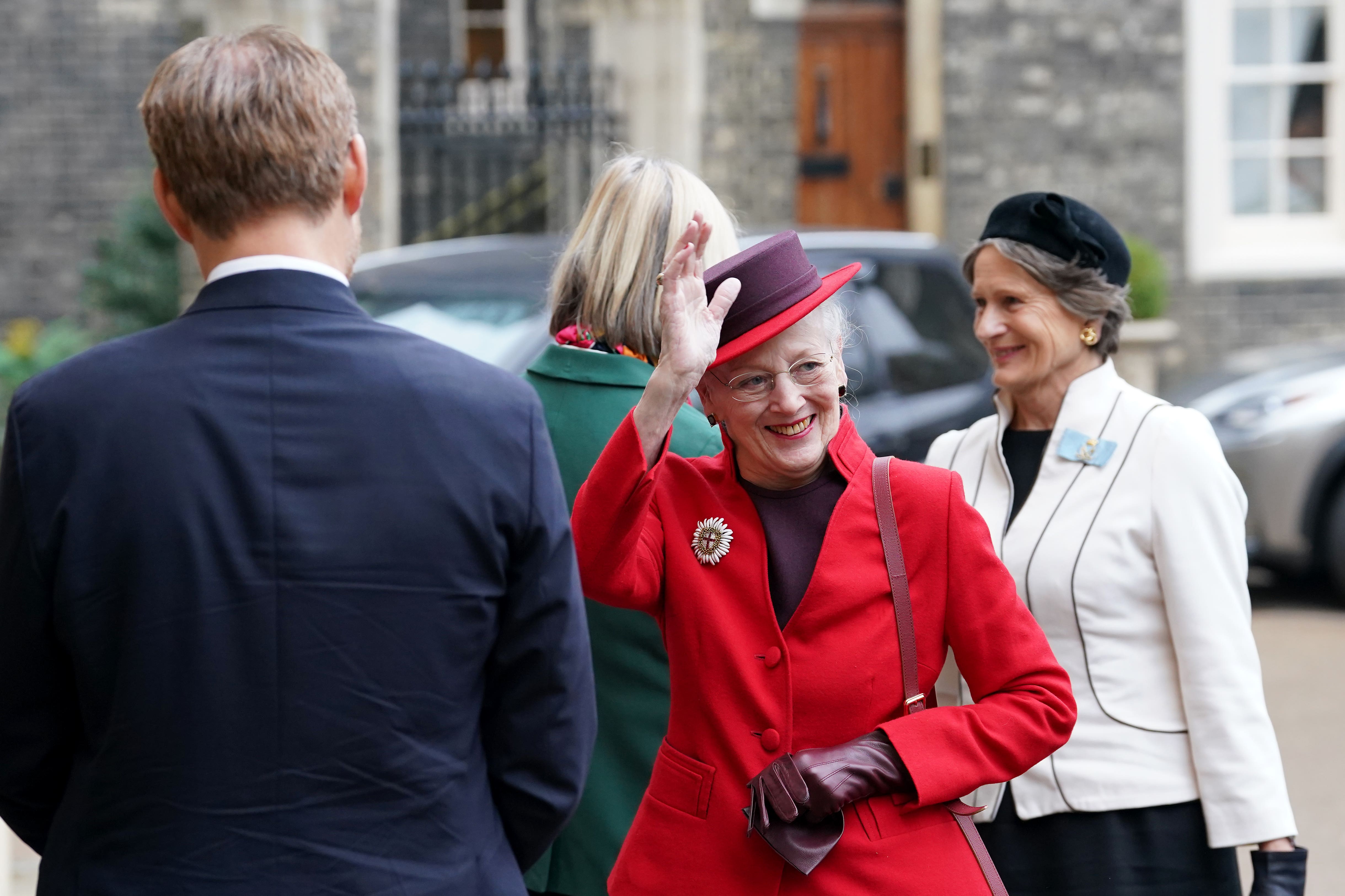 Queen Margrethe II of Denmark waves to well-wishers as she visits the Danish Church of St Katharine’s in Camden (Gareth Fuller/PA)