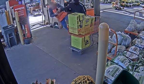 Surveillance footage captured a shoplifter shoving Home Depot worker Gary Rasor