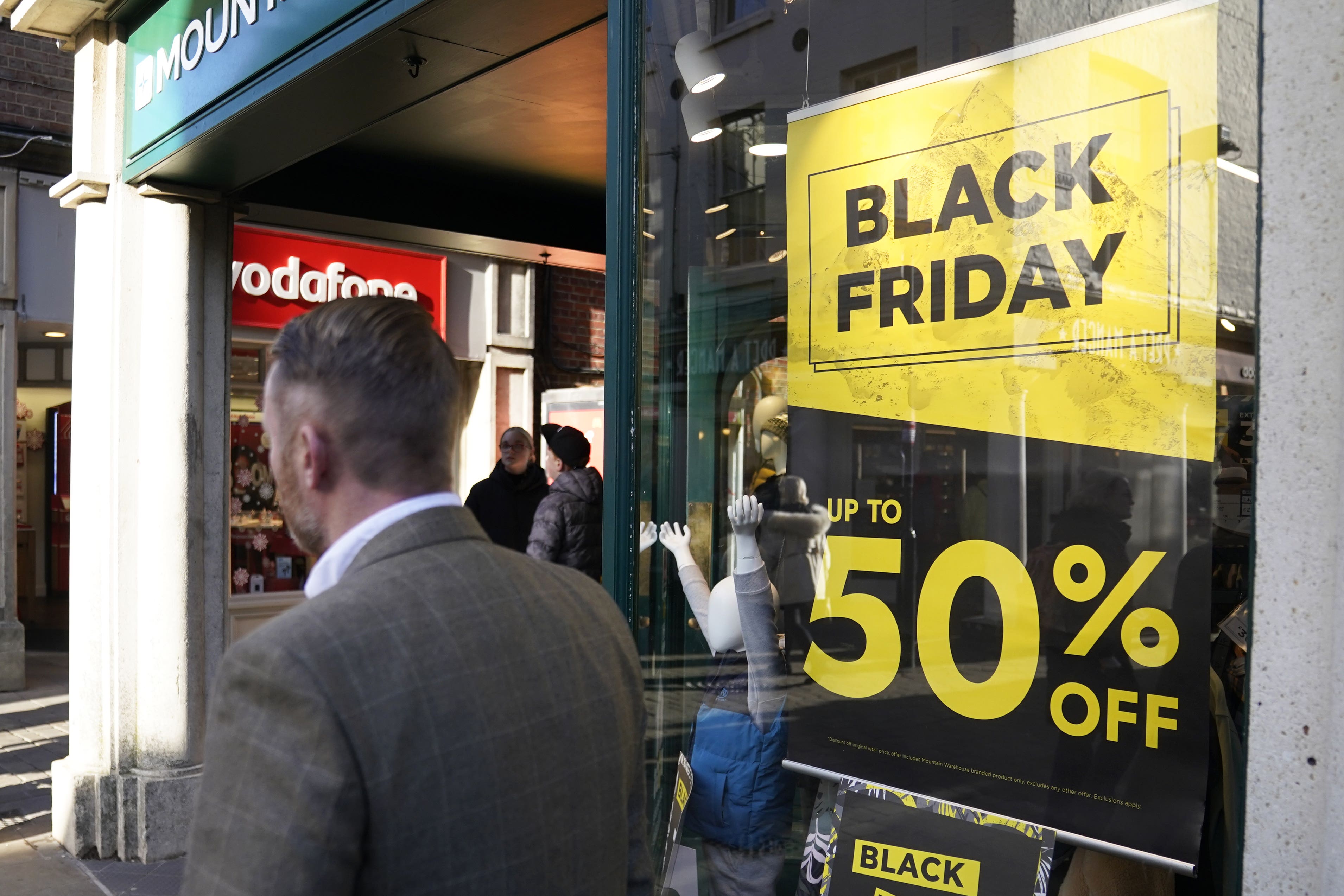 Shoppers on Winchester’s High Street on Black Friday (Andrew Matthews/PA)