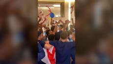 England team players celebrate at World Cup basecamp following Senegal win