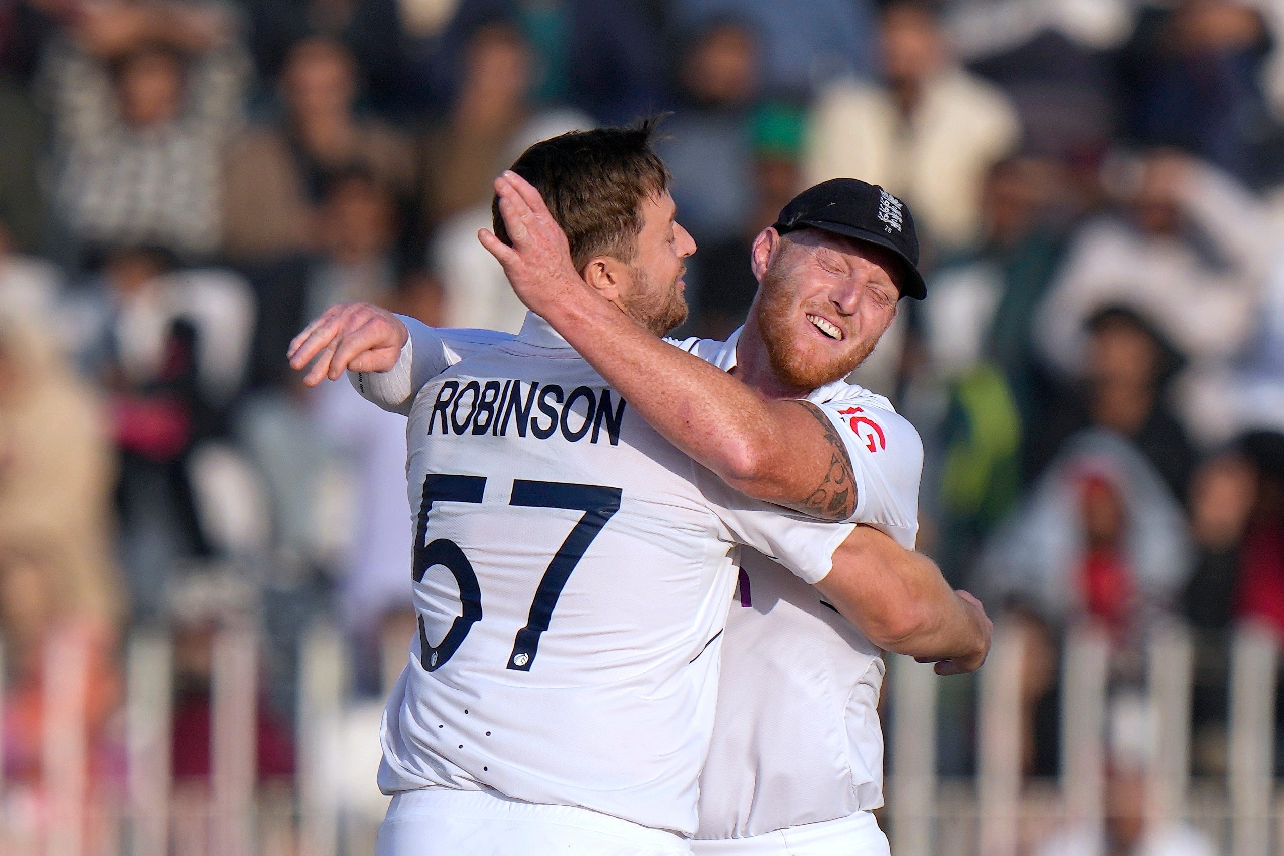 Ollie Robinson, left, celebrates with Ben Stokes (Anjum Naveed/AP)