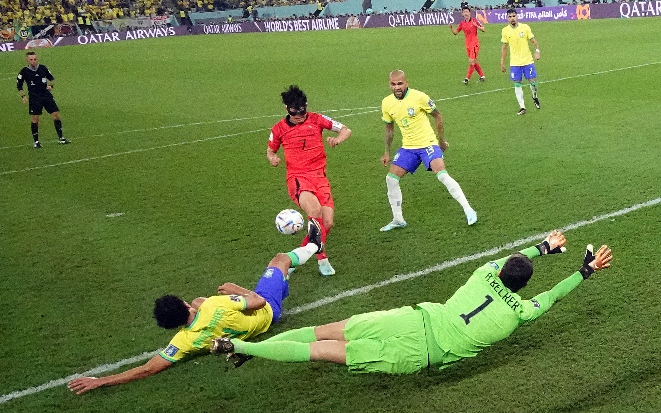 Marquinhos completes a double-block to keep out Son Heung-min