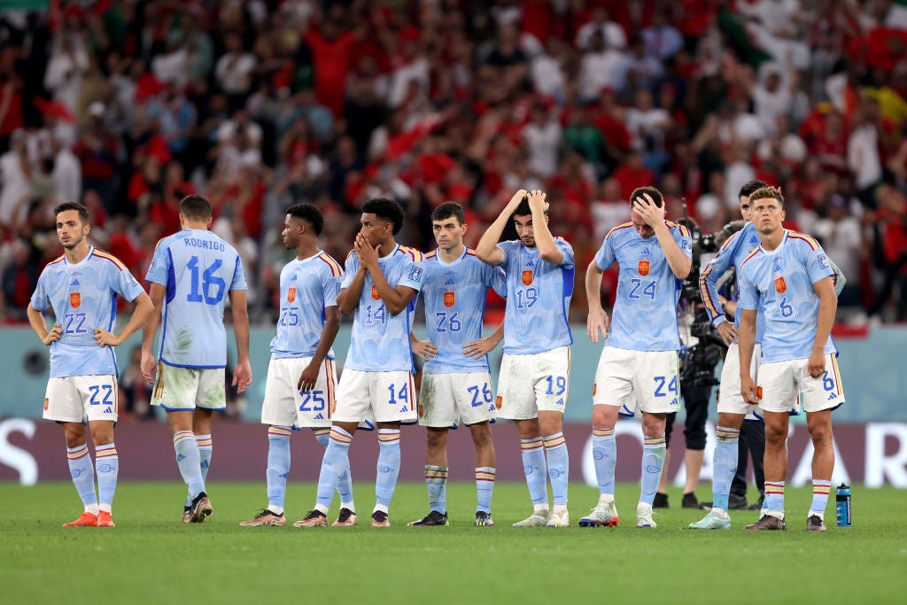 Anguished Spanish players after their shootout defeat