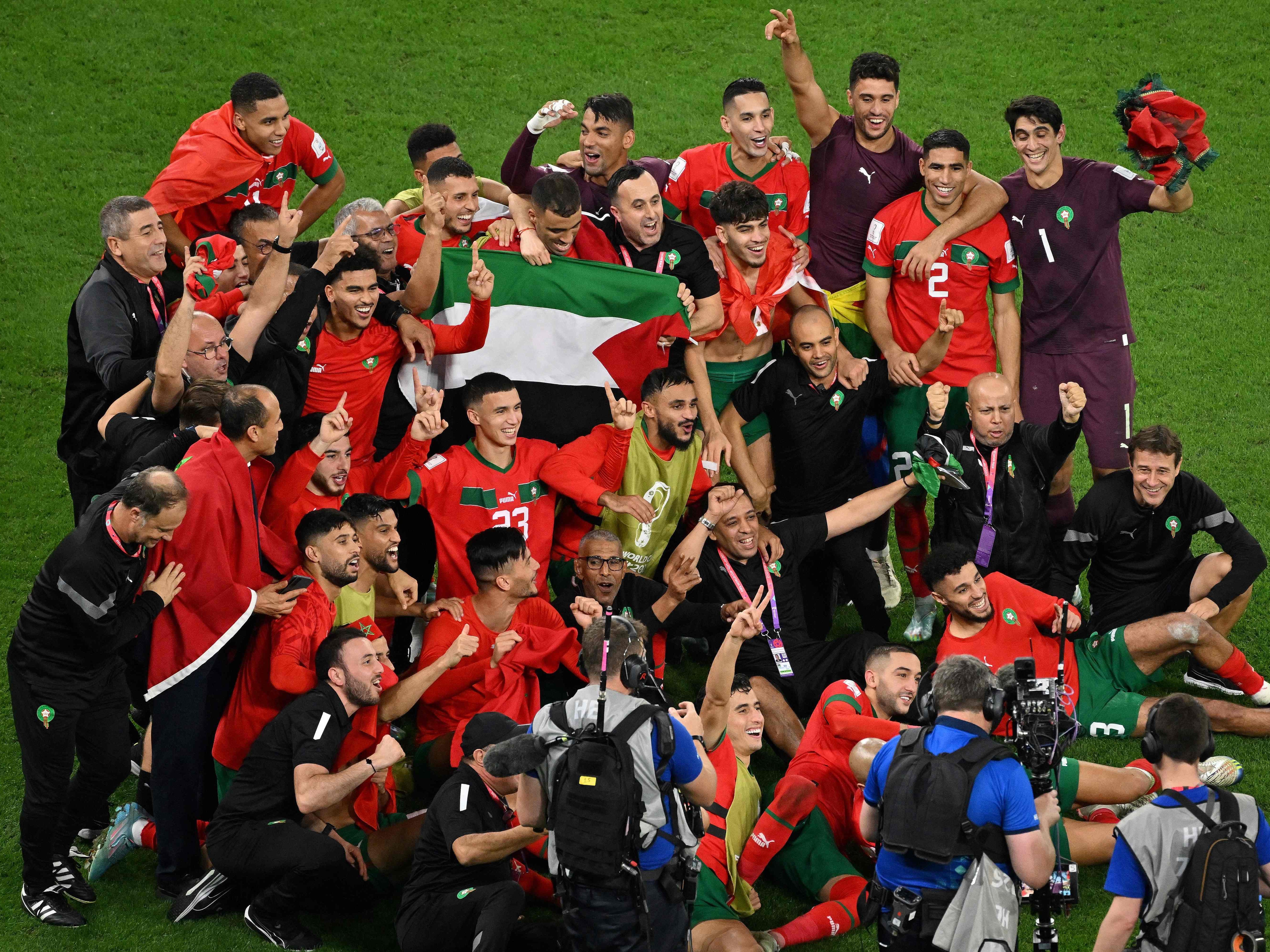 Morocco celebrated a famous win over Spain