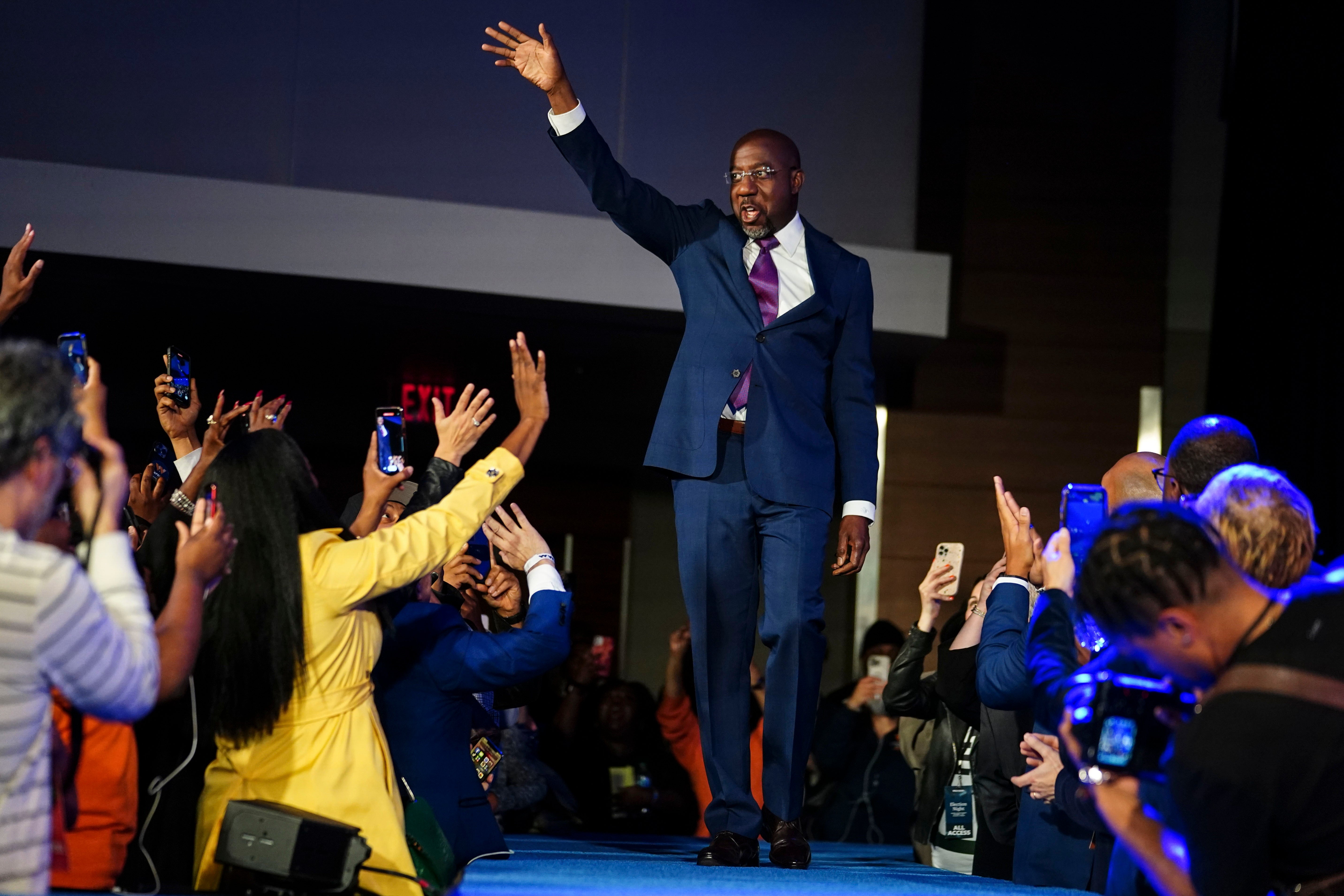 Raphael Warnock at an election party