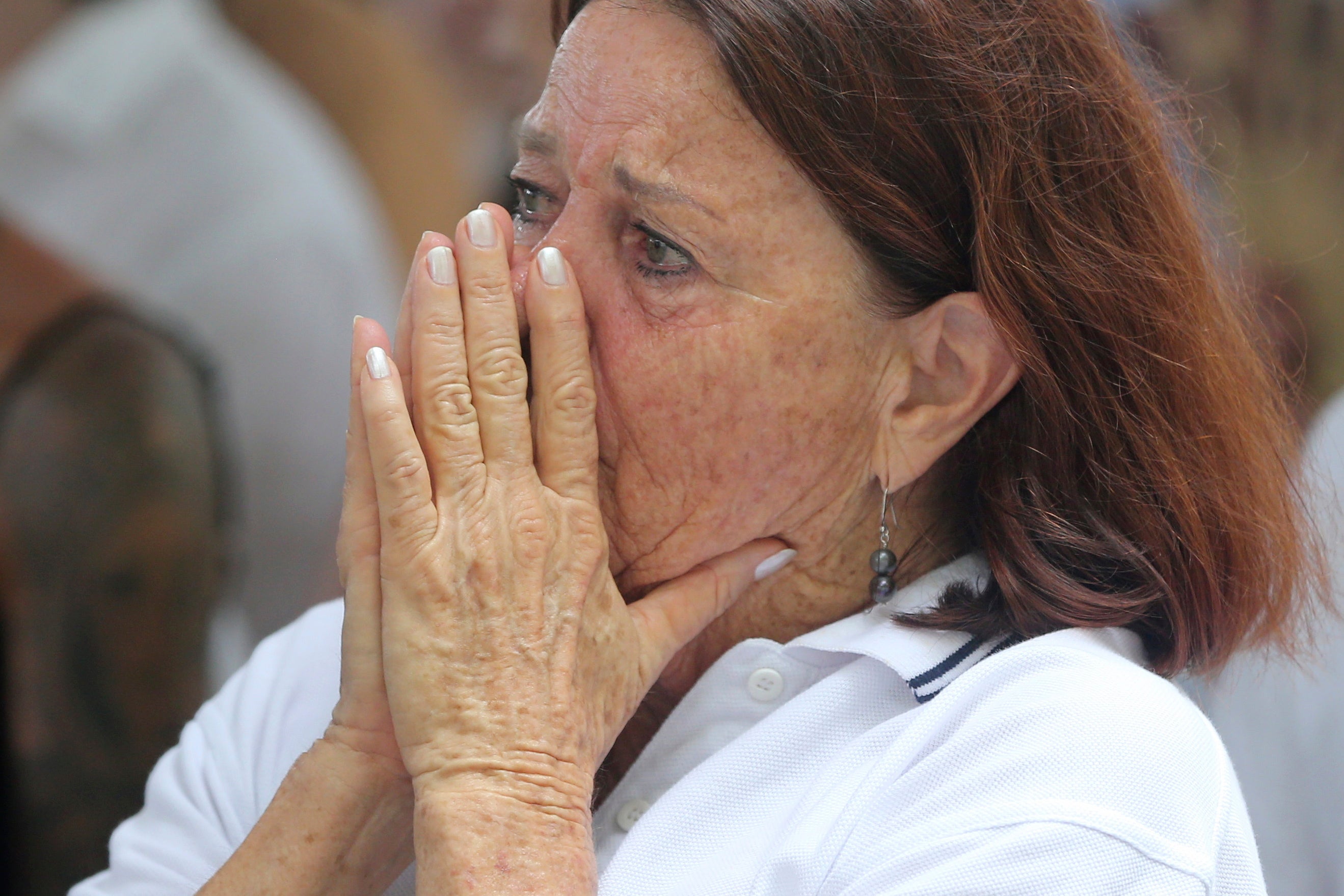 A victim’s relative reacts during the commemoration of the 20th anniversary of the Bali bombing at the Australian Consulate in Denpasar, Bali, Indonesia, on 12 October