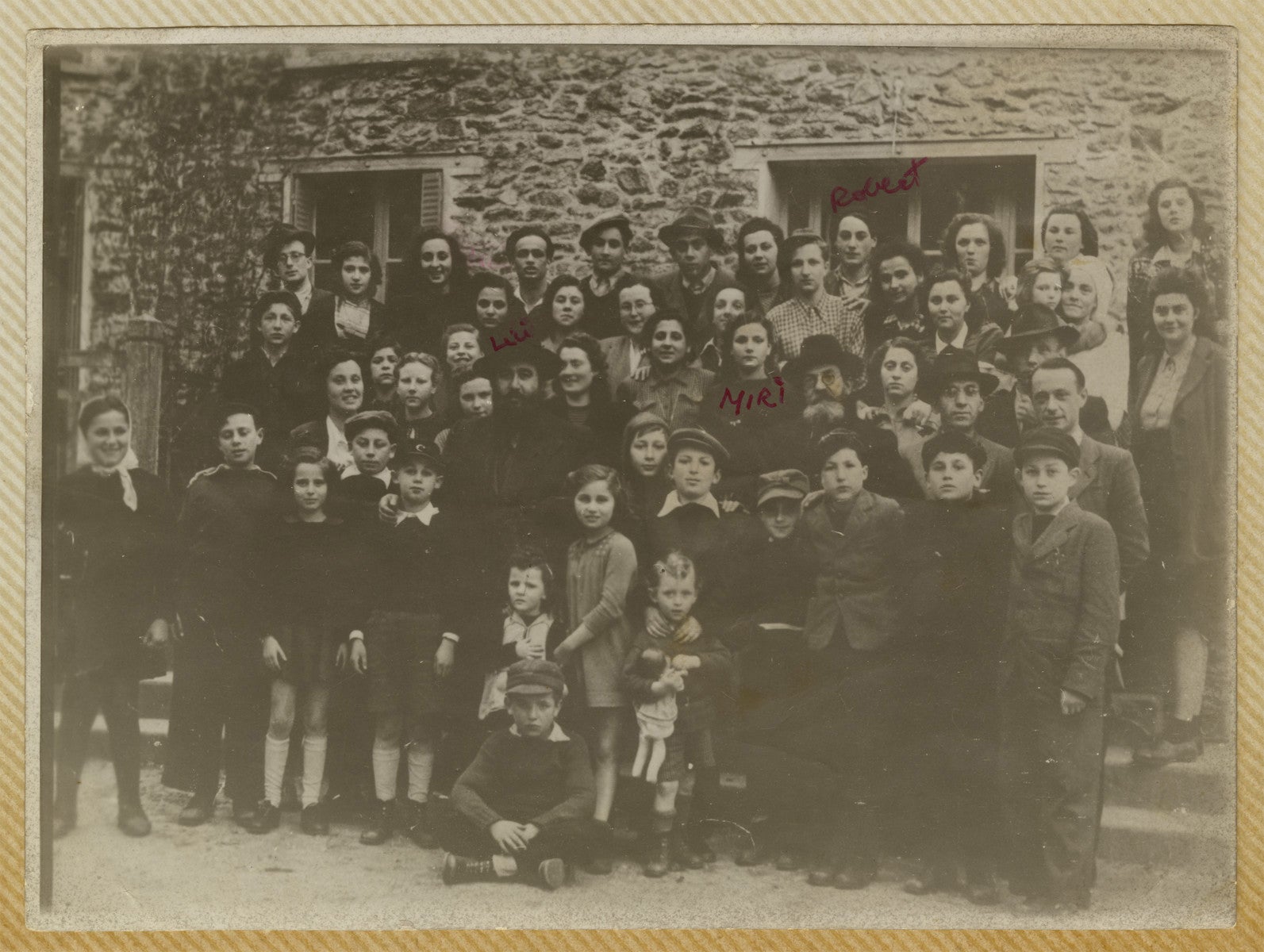 Blanche Fixler, middle front between two smaller children, spent some time in a displaced person's camp in France after WW2 ended