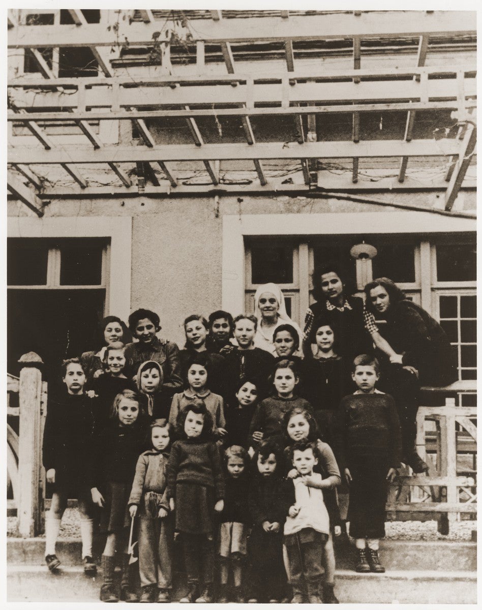 This photo featuring Blanche Fixler was found by Daniel Patt. Fixler is shown bottom right, with her arm around another child