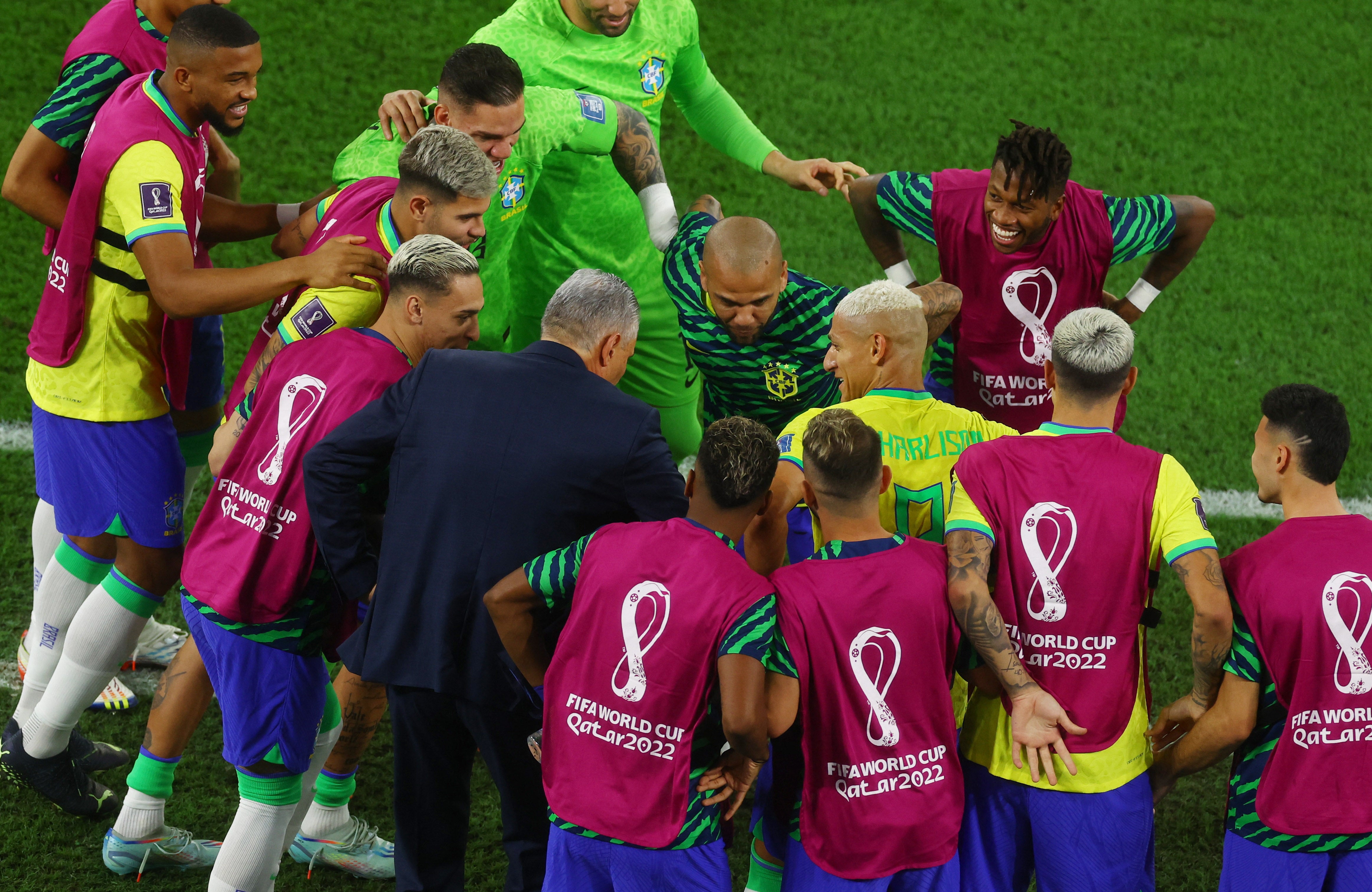 Tite dances with Richarlison and Brazilian teammates