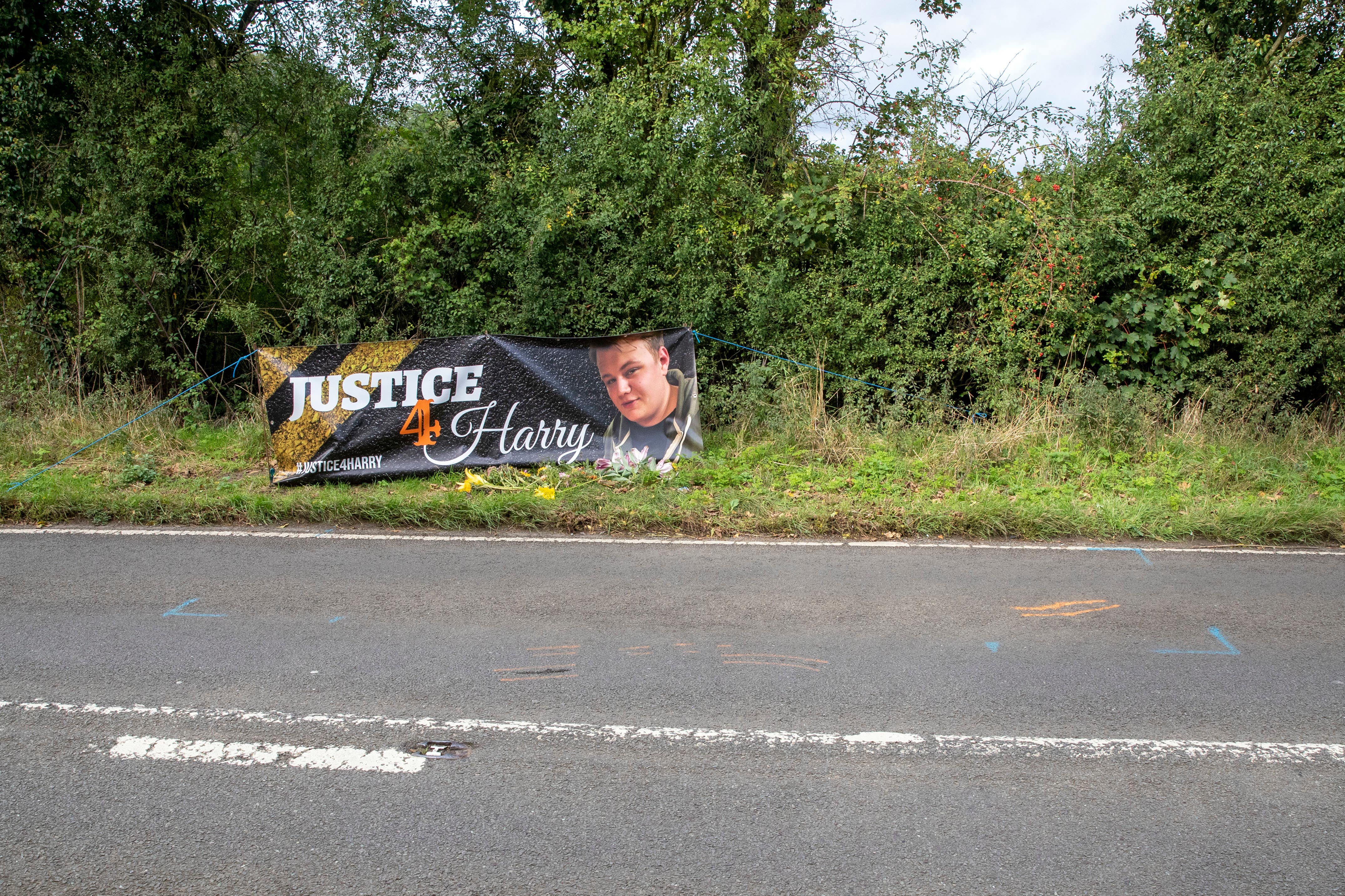 Floral tributes on the B4031 outside RAF Croughton (Steve Parsons/PA)