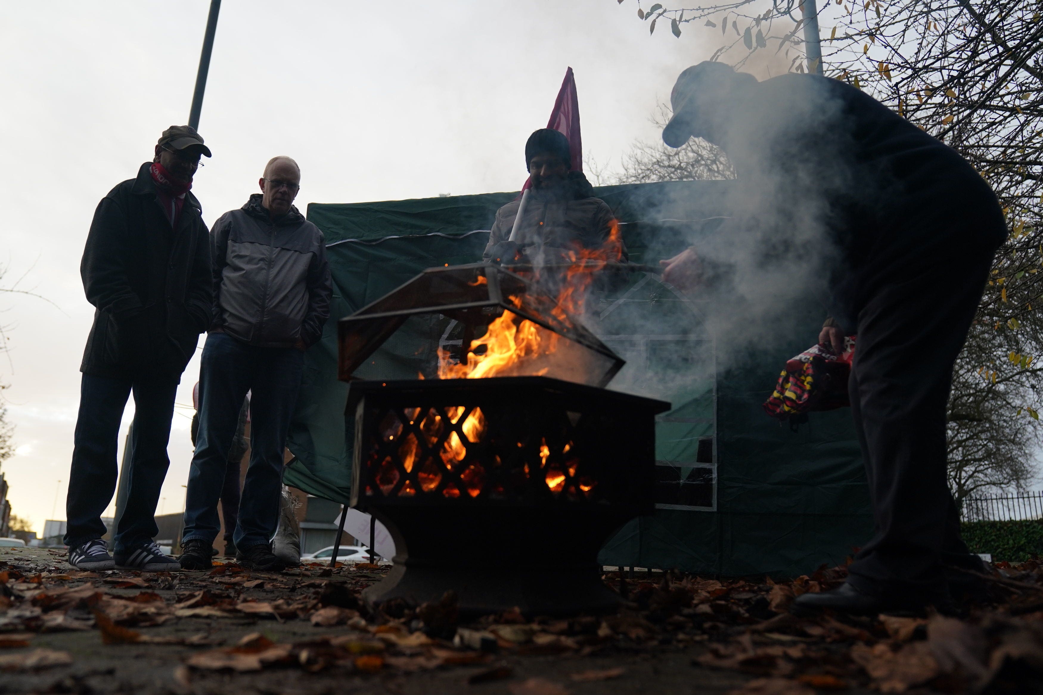 Postal workers on the picket line at the Central Delivery Office and Mail Centre in Birmingham, last month (Jacob King/PA)