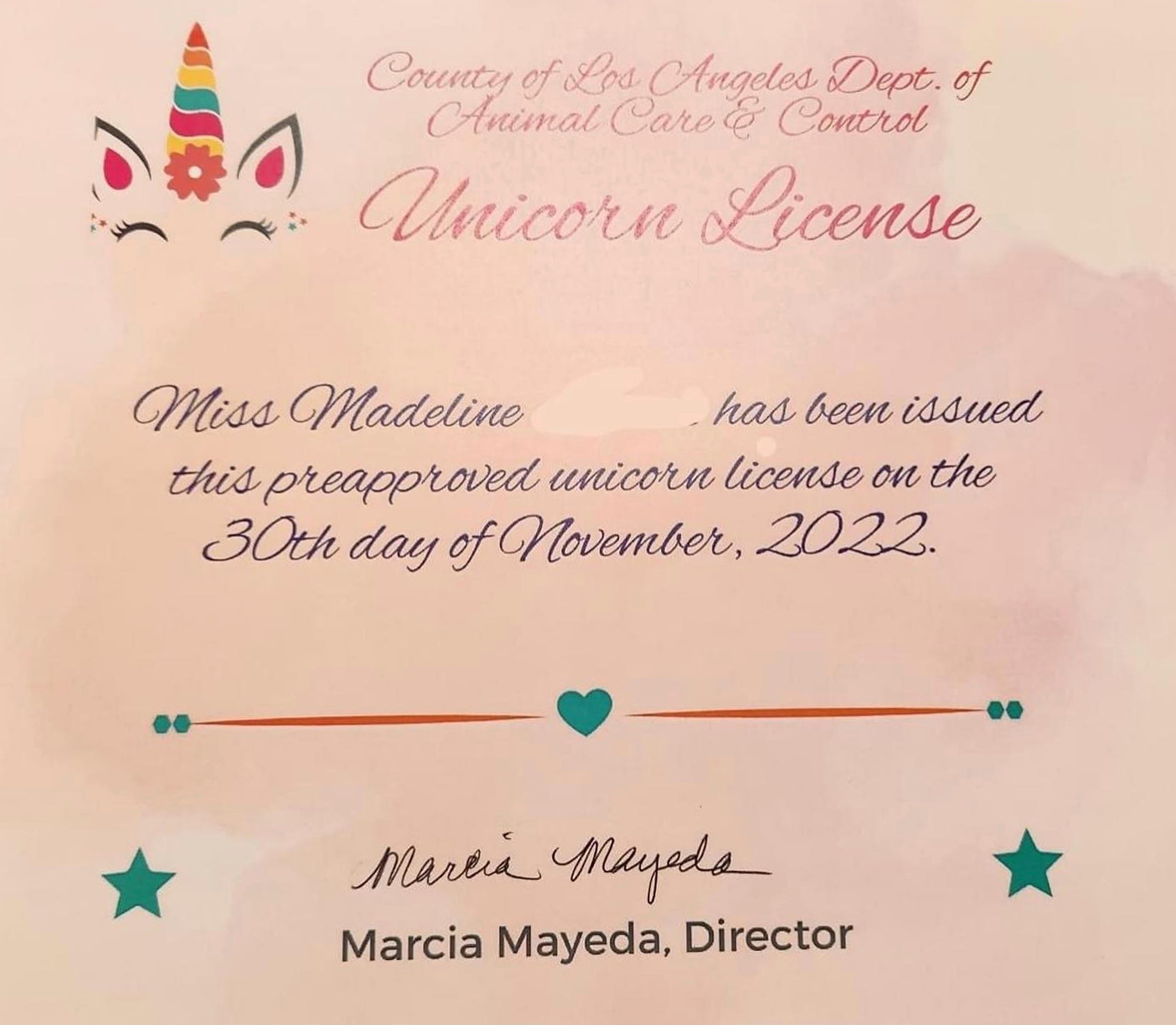 This image released by the Los Angeles County Animal Care and Control and posted via Instagram, shows an "unicorn license," after a young girl requested permission to have a unicorn in her backyard