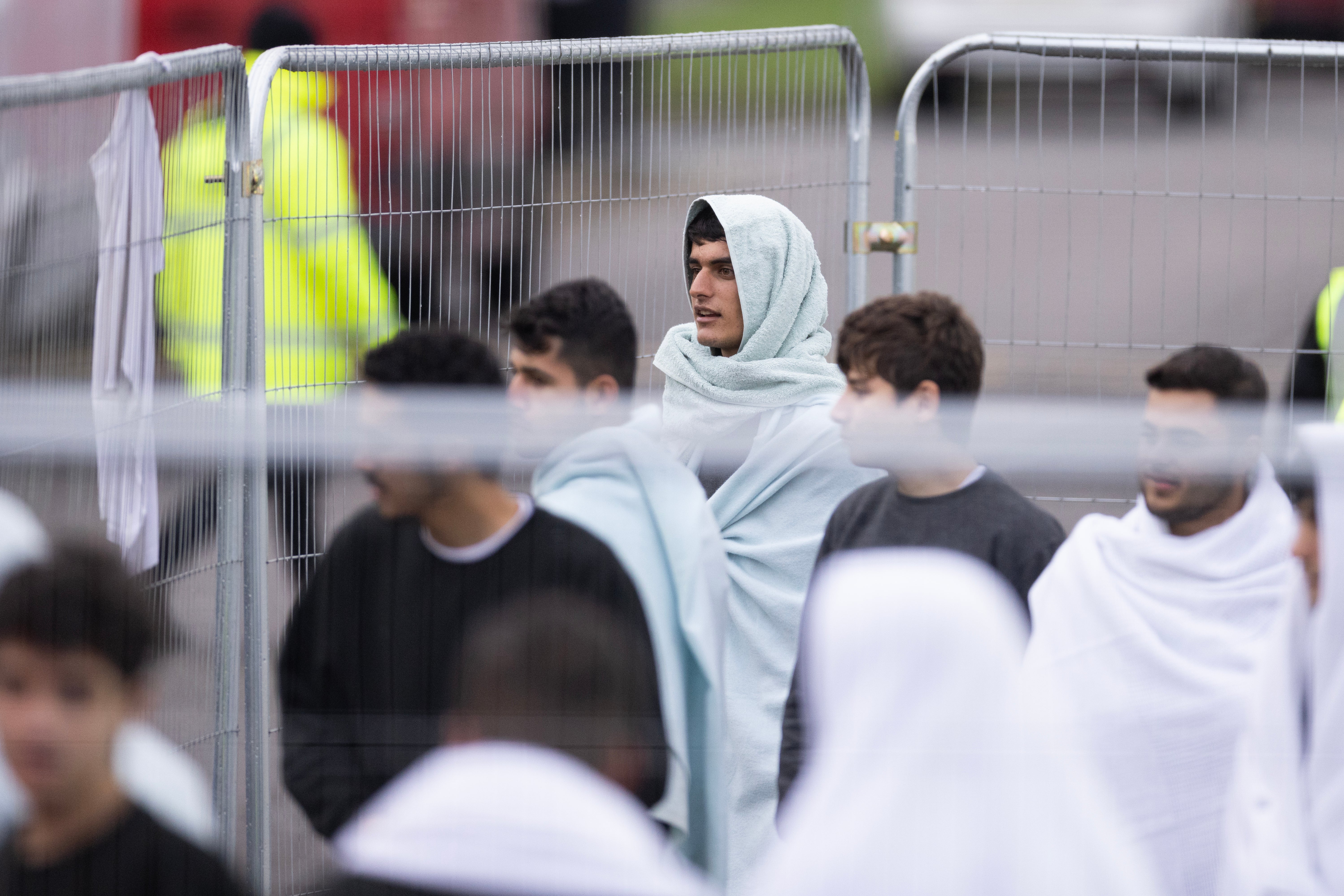 Men being processed as an asylum centre in Kent. The UK’s treatment of refugees is among concerns raised by the commissioner