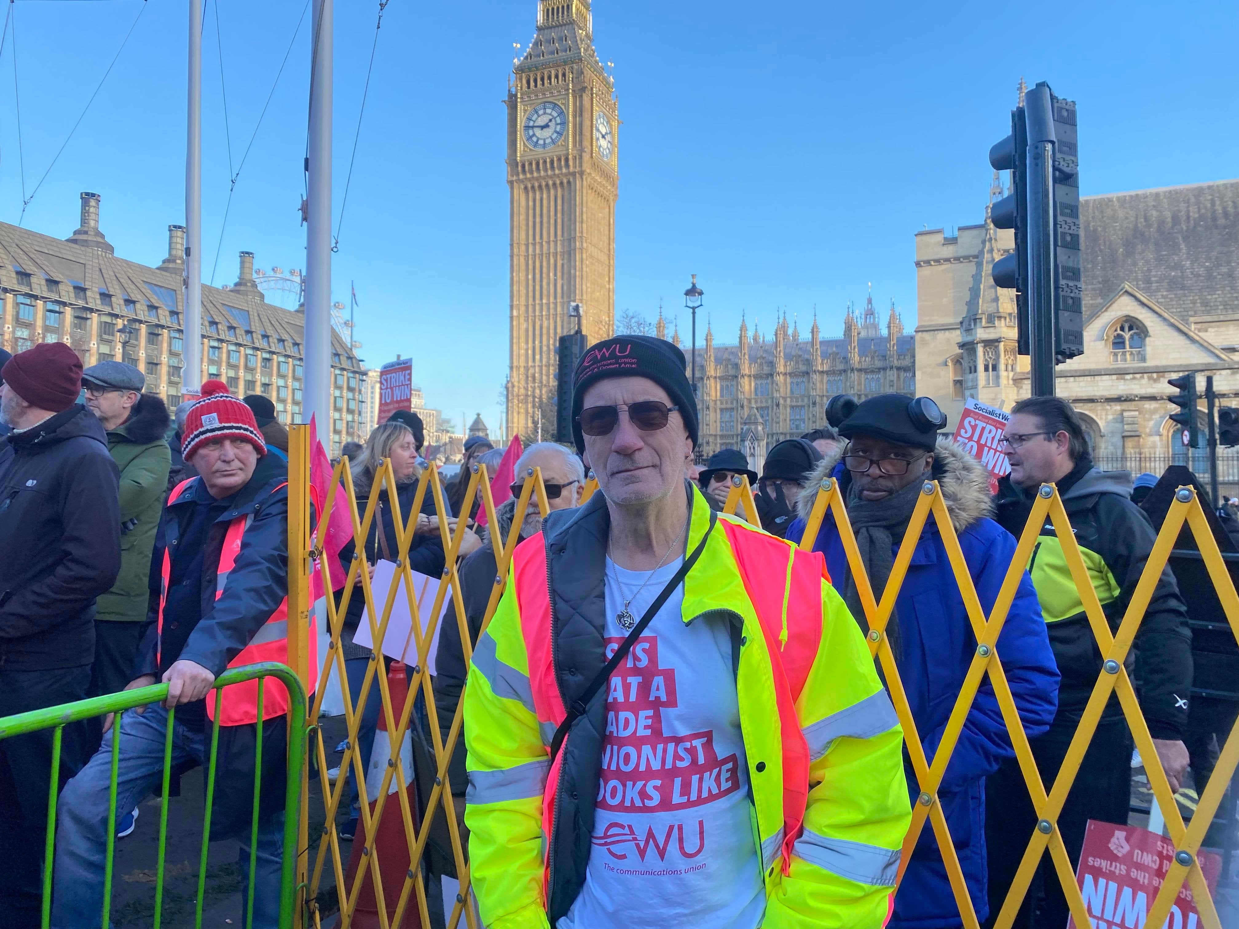 Royal Mail worker Gary Vipond (62) protests at Parliament Square rally