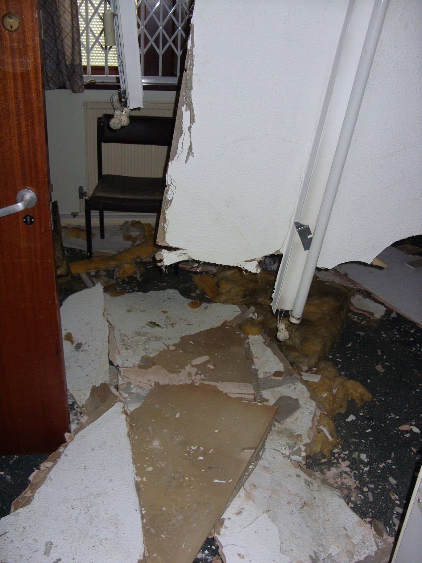 Roof Collapse caused by water leaks in the roof void which led to the plaster falling in.