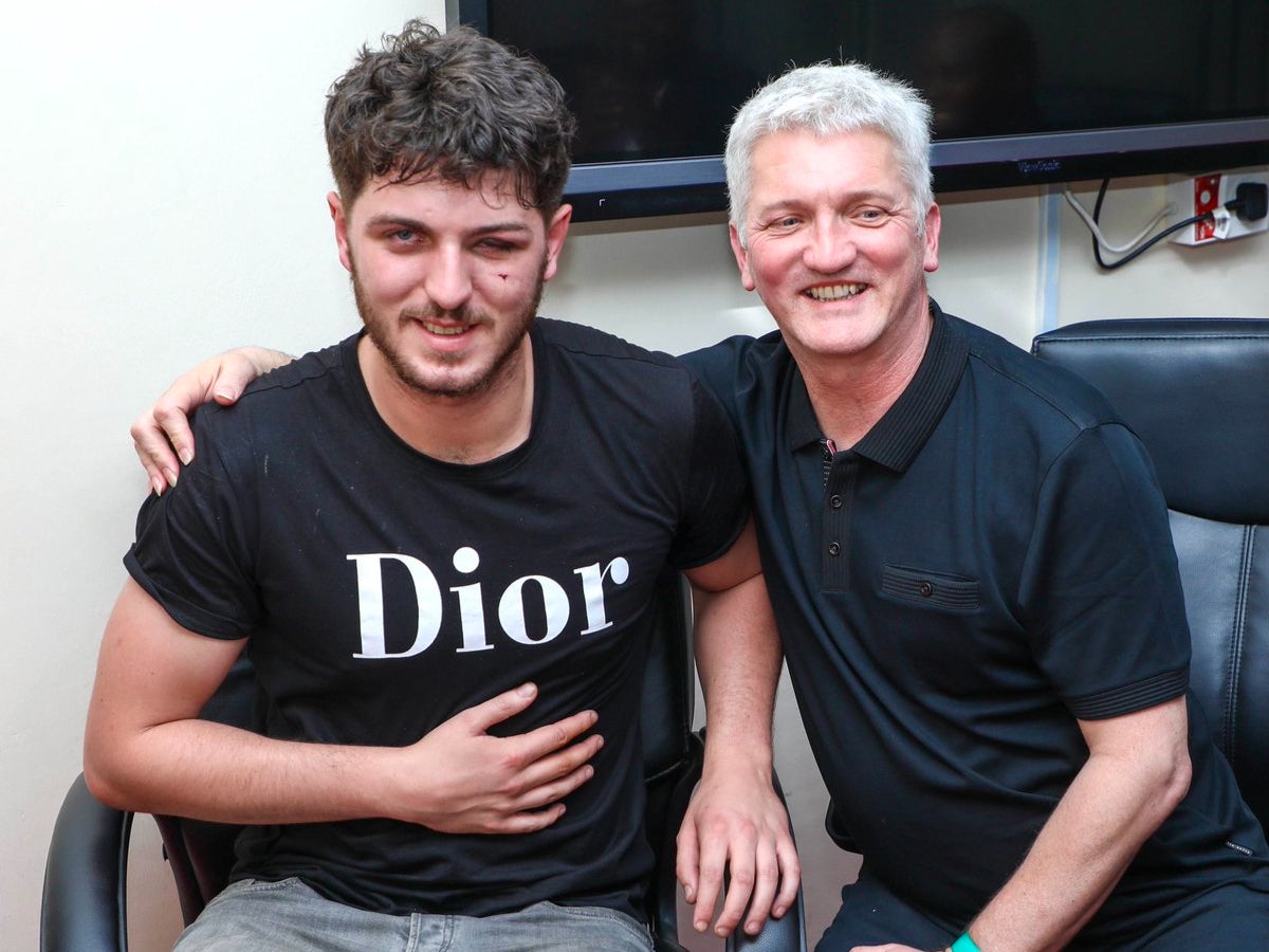 The missing man (left) has been reunited with his father (right)