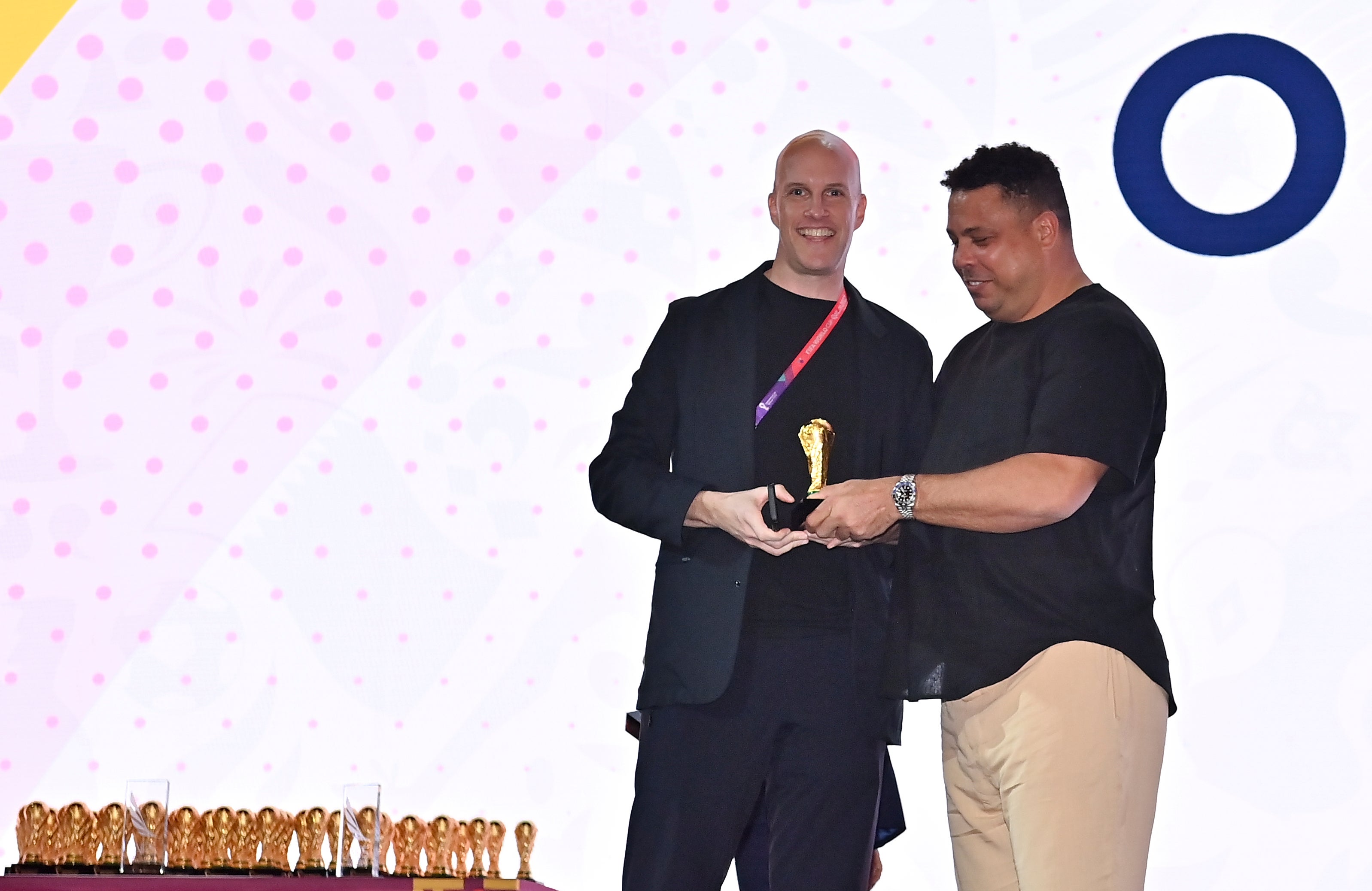 Grant Wahl was awarded a World Cup replica trophy by soccer legend Ronaldo during an award ceremony in Qatar on 29 November.