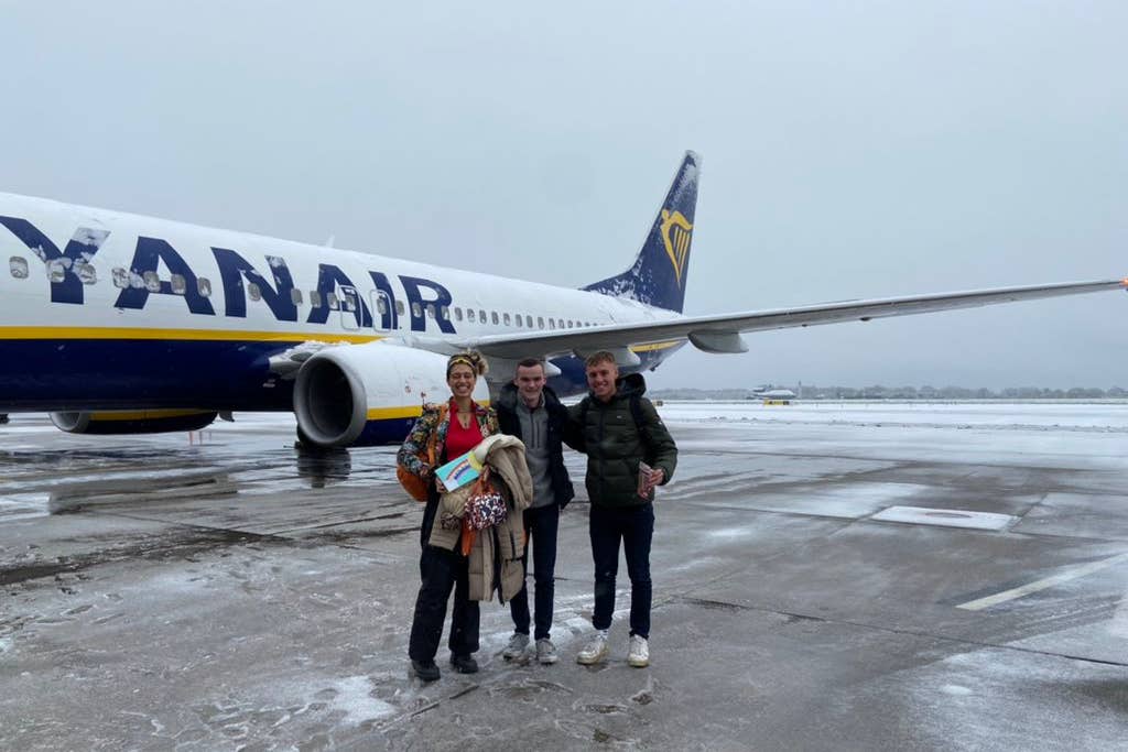 Daniel Jones (right) with his friends Amber Hewitt (left) and Joe Green (centre) in front of his flight (Daniel Jones/PA)