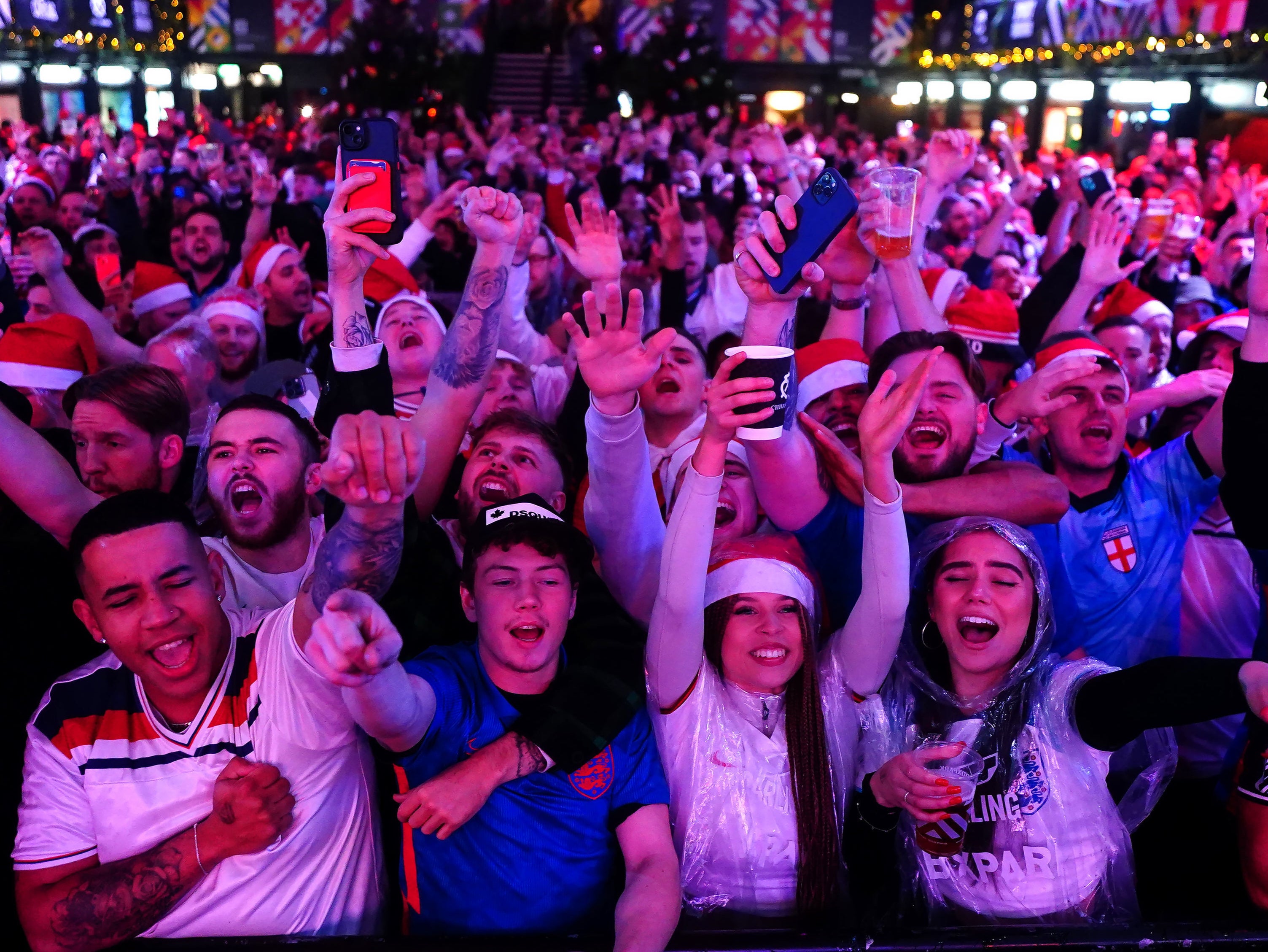 Jubilant fans in Croydon, south London, after England scored